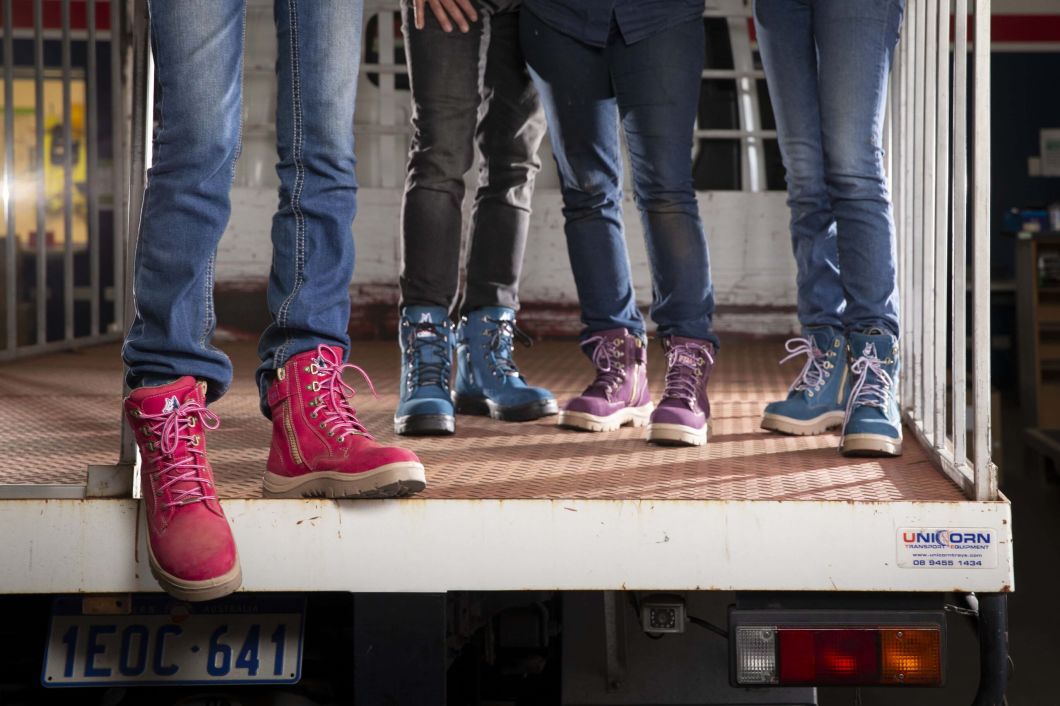 pink, blue and purple boots