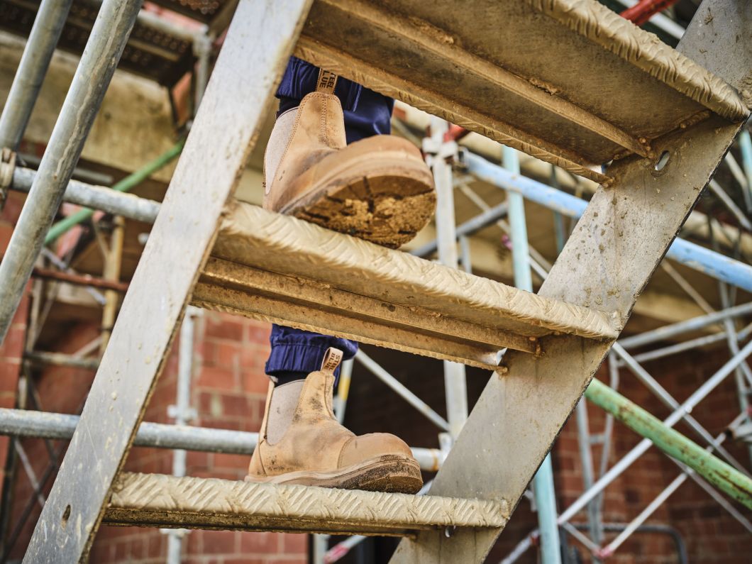 Plumber wearing hobart pull-on safety boots