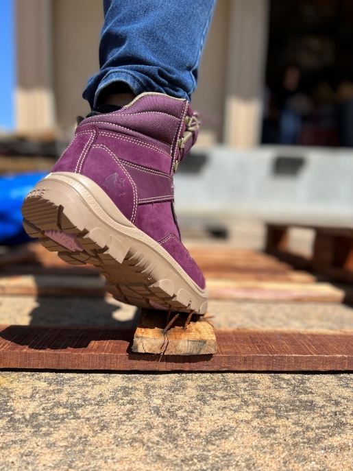 Purple boot pr mid sole close up
