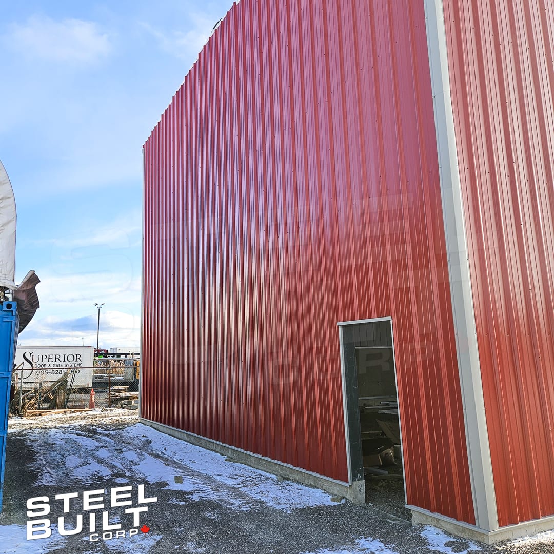 Vibra Finish 40 by 128 foot industrial steel building exterior in Mississauga, Ontario