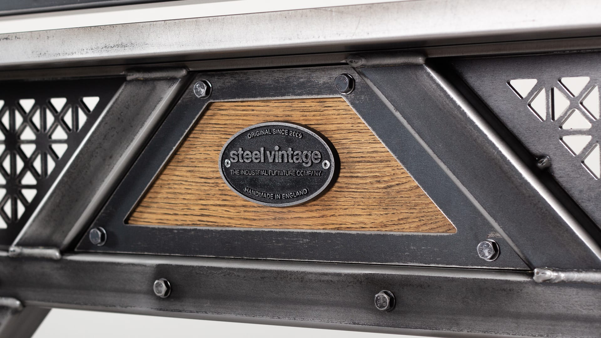 Steel Vintage steampunk glass board trolley closeup of badge