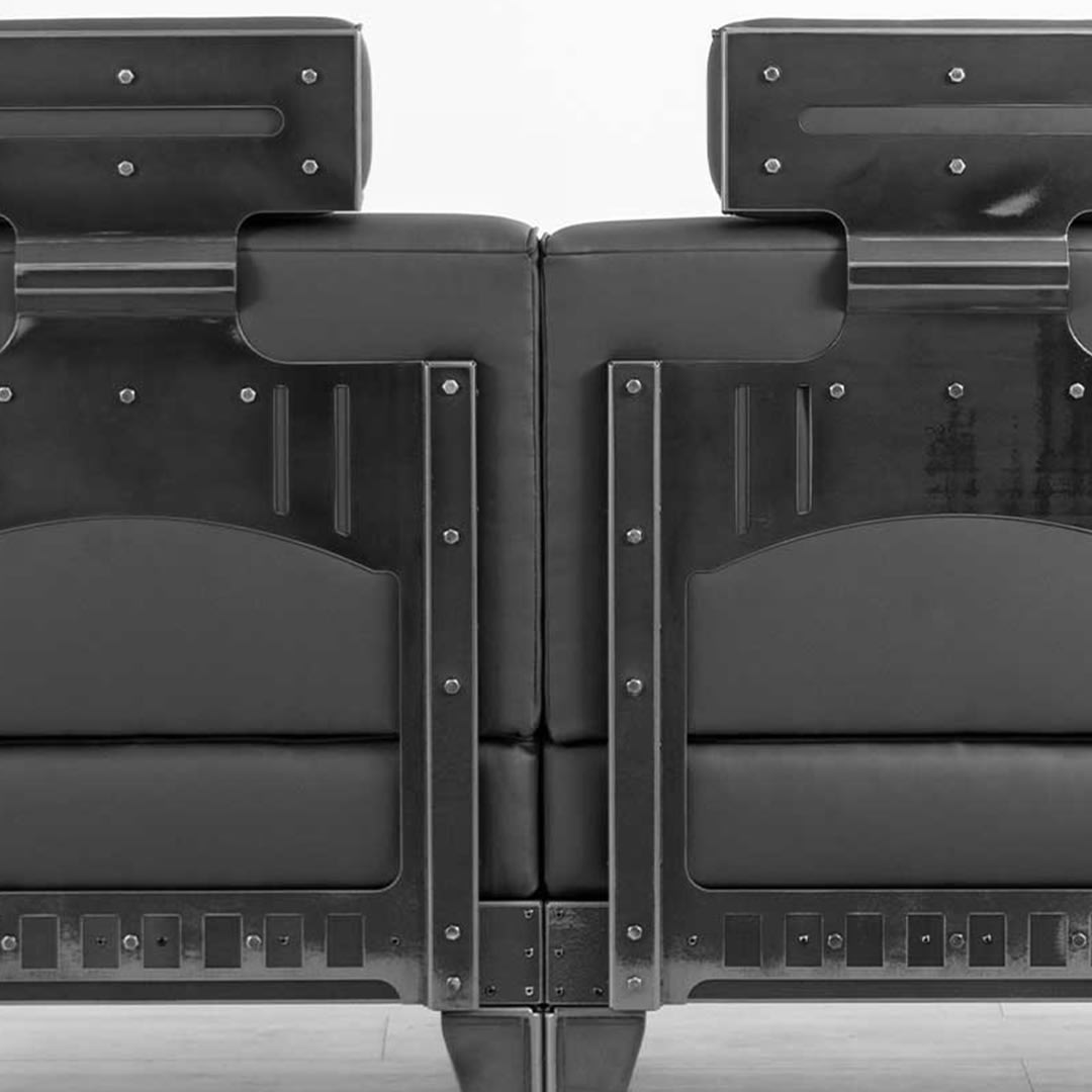 INDUSTRIAL STYLE FAUX LEATHER SOFA WITH GREY LEATHERETTE, PIPING DETAILS AND STEEL FRAME