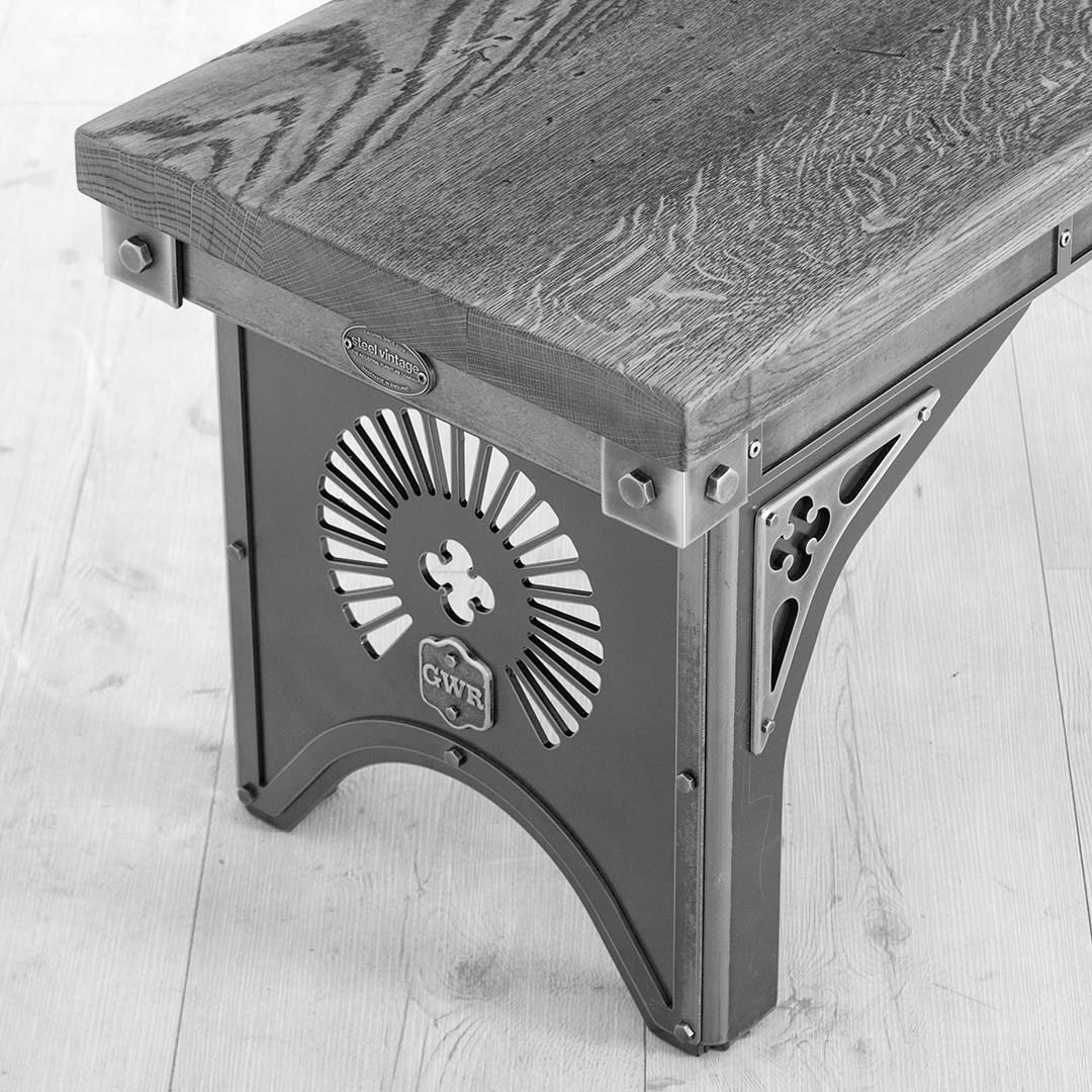 industrial style steel bench with oak top and brass details