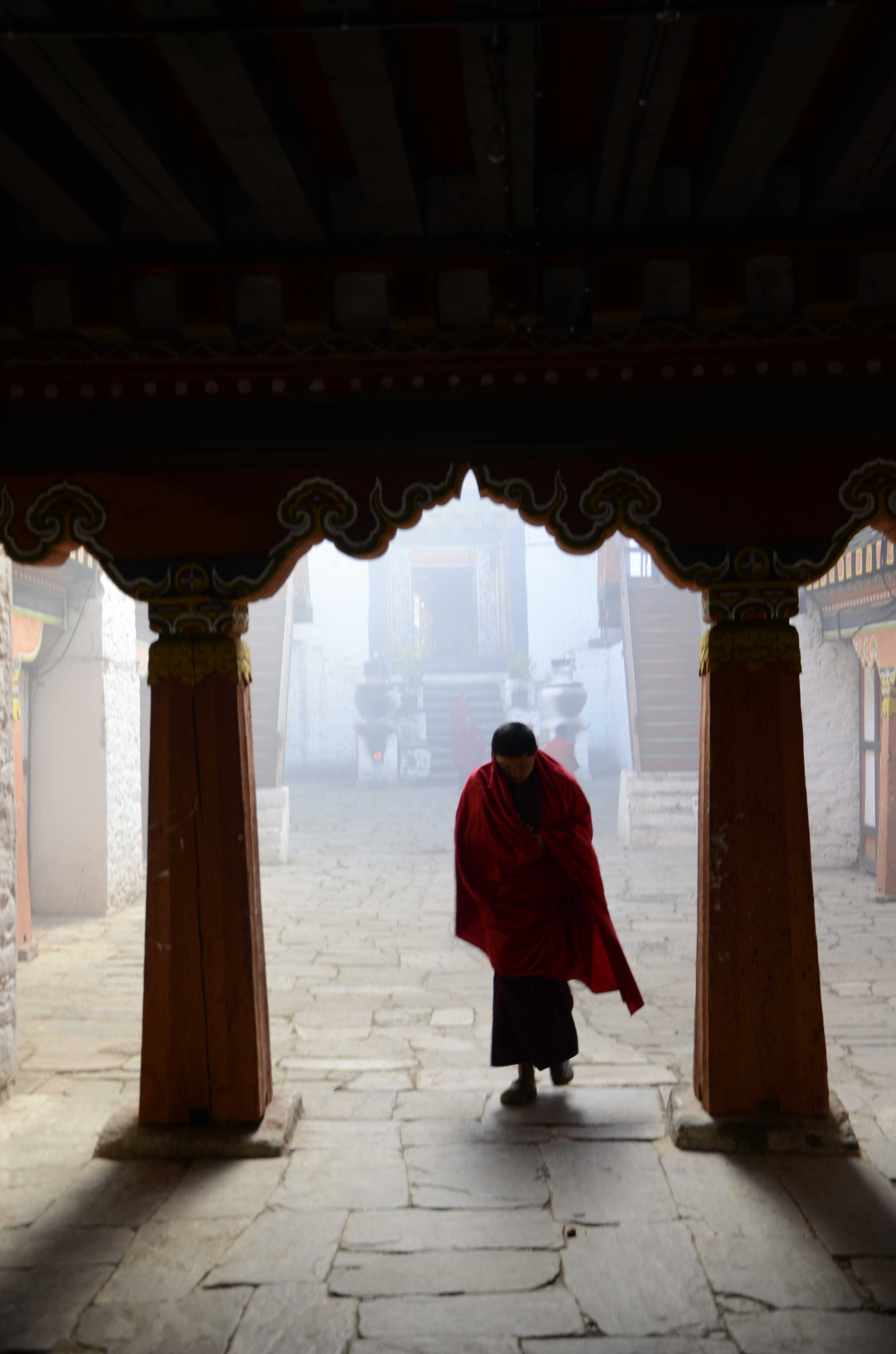 Monk, Traversed a Smokey Courtyard