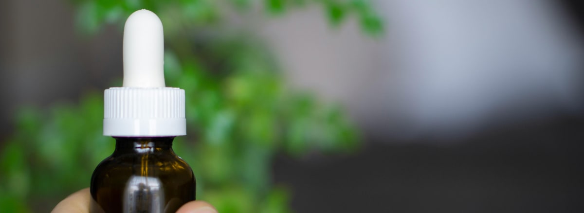 Scientist showing vaccine vial