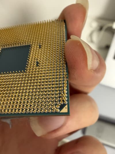 An AMD CPU with severely bent pins