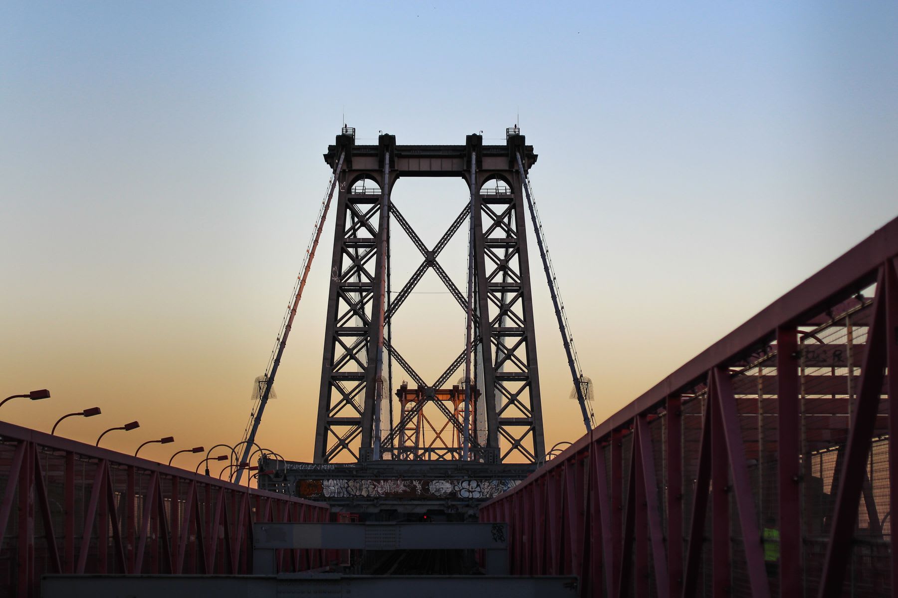 Top of a lift bridge at dusk under a clear sky