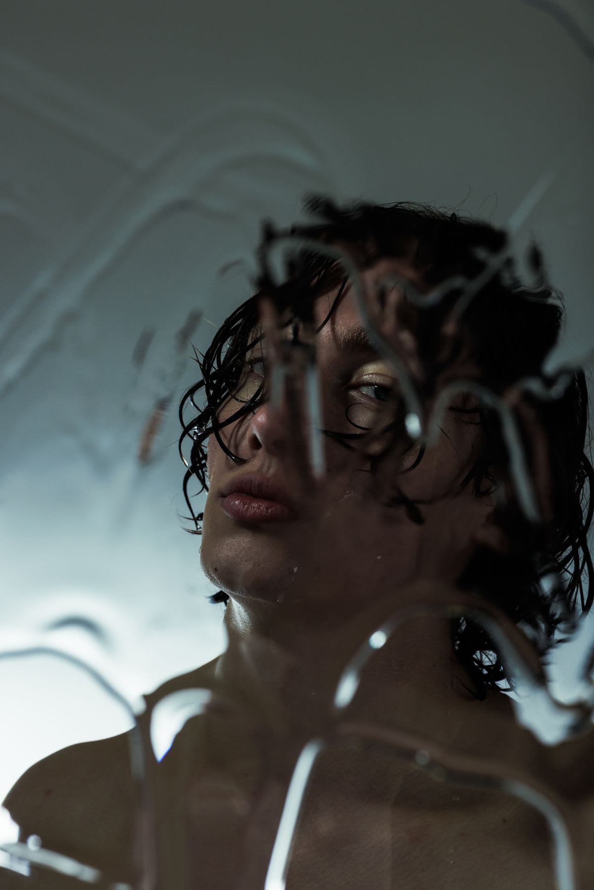 a person looking down at a mirror