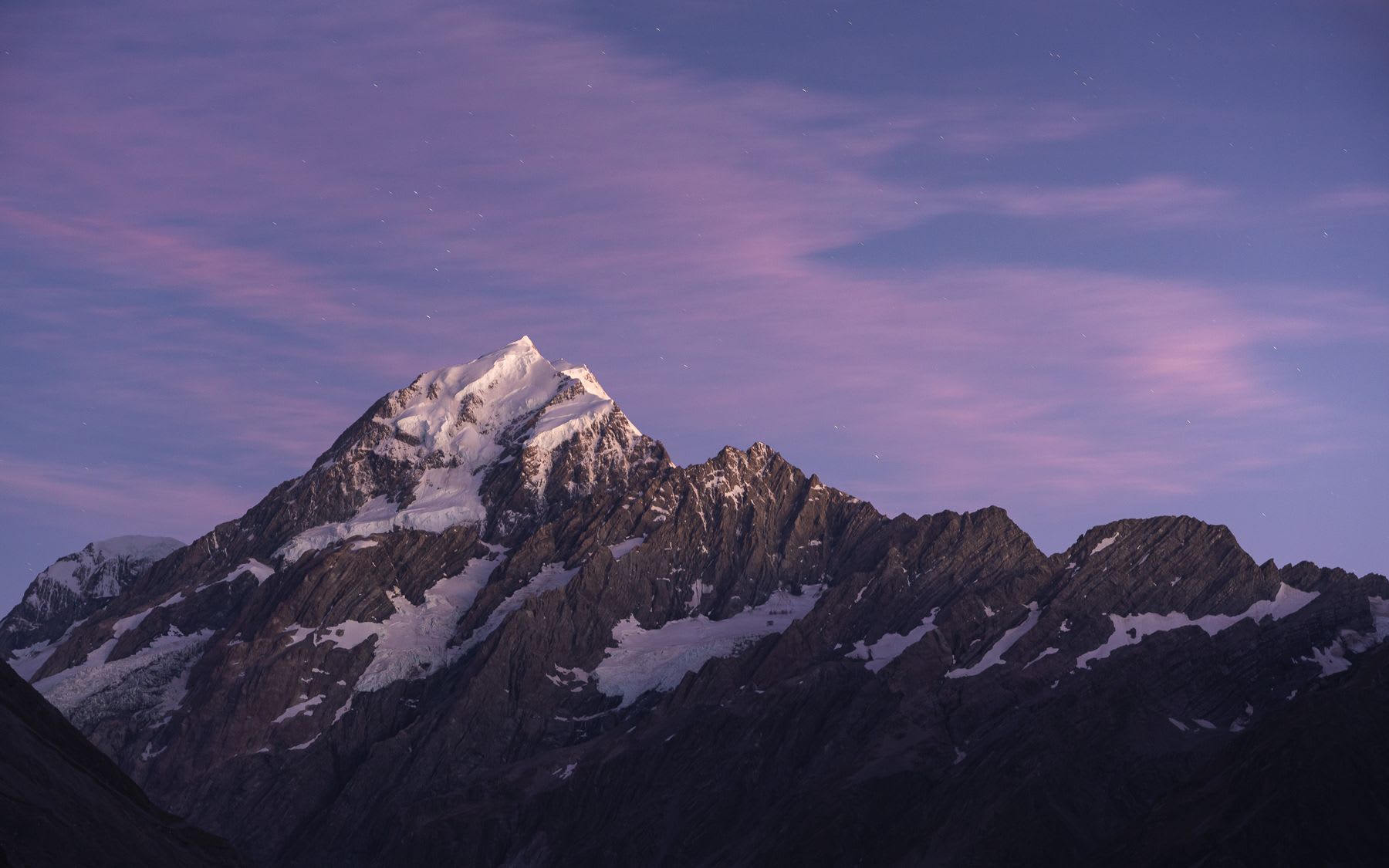 A snow covered mountain peak.