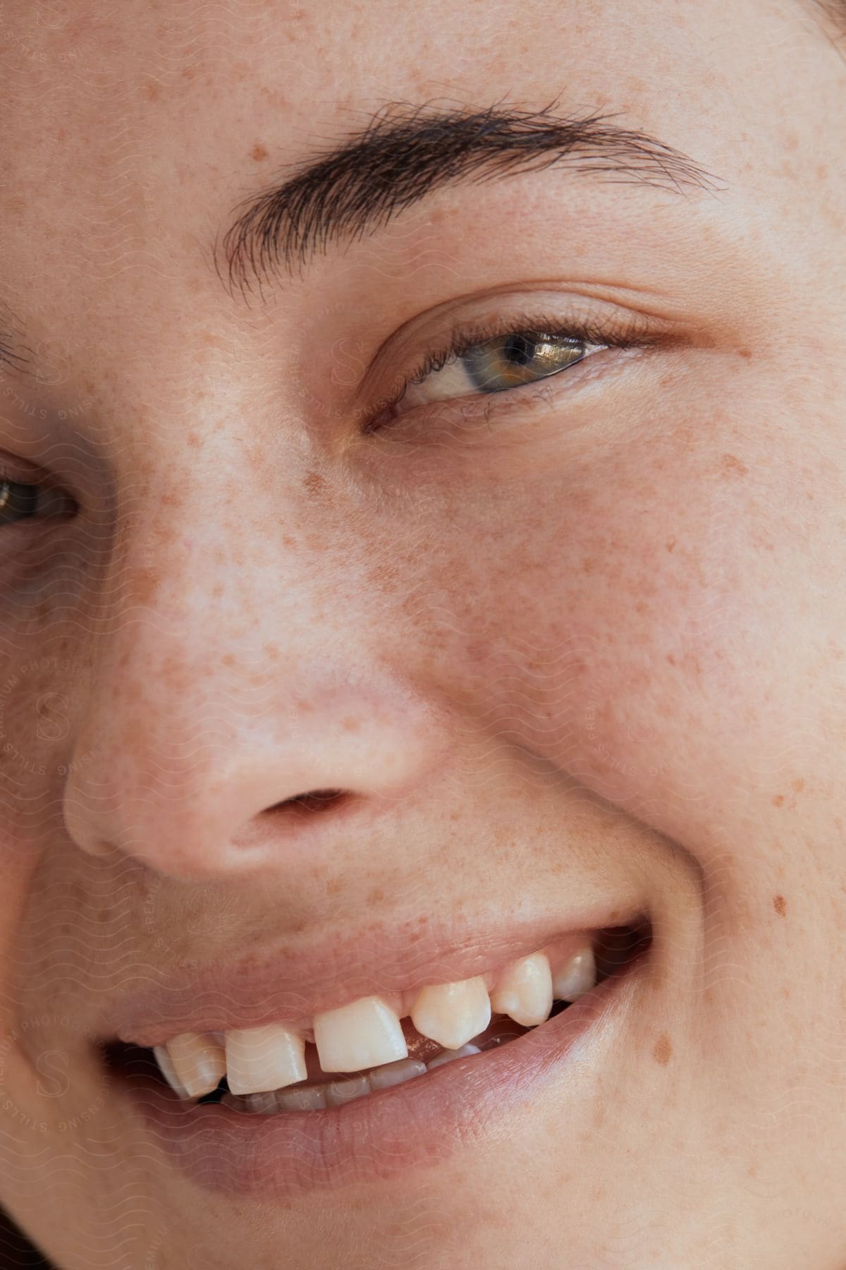 Close up of woman's face laughing