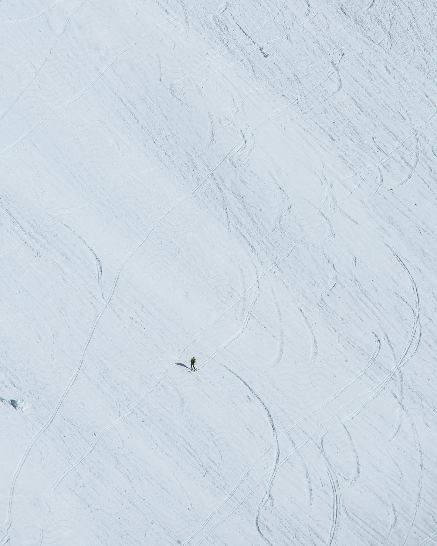 Aerial view of a man snow skiing