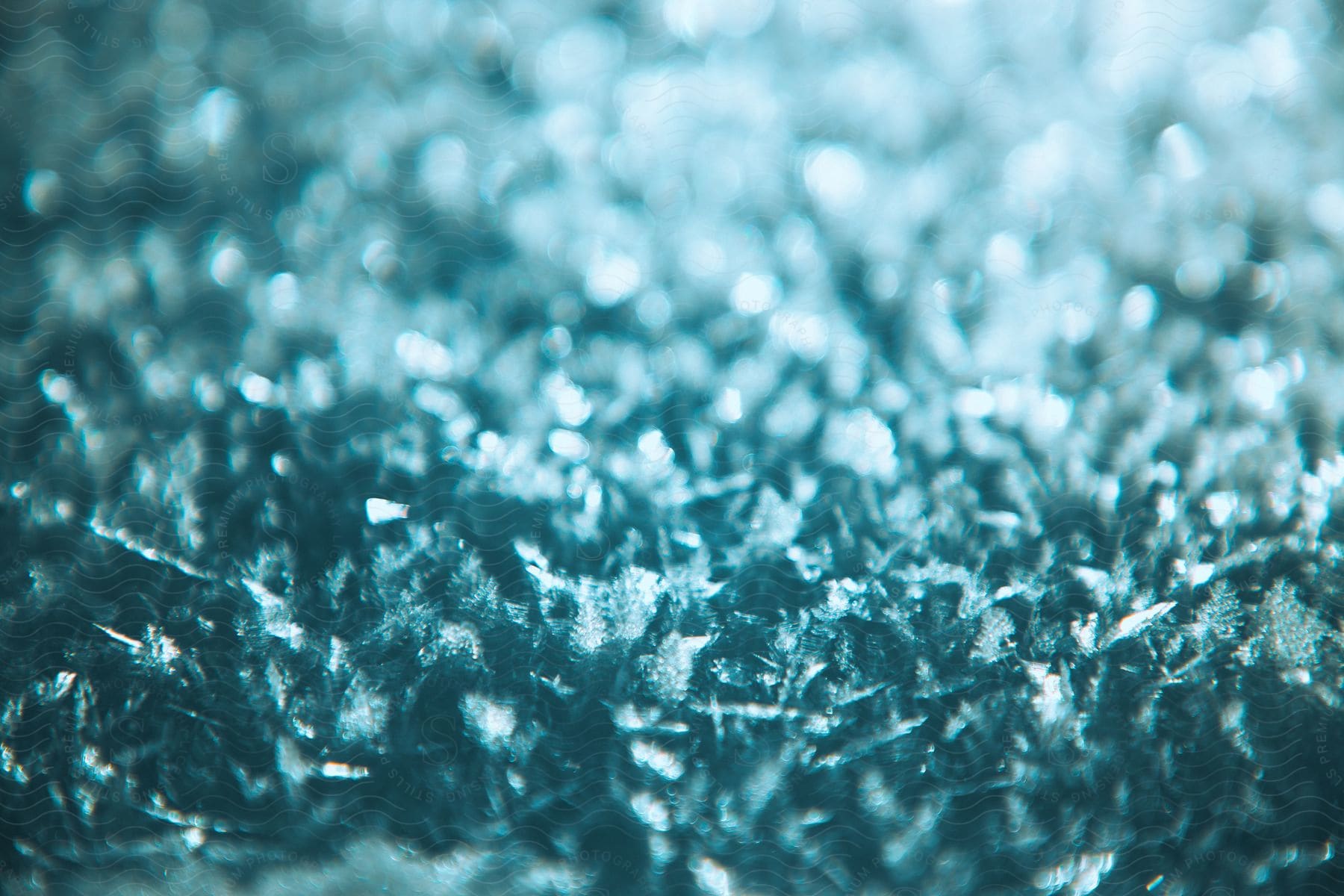 Stock photo of glitter texture background with blue crystals.