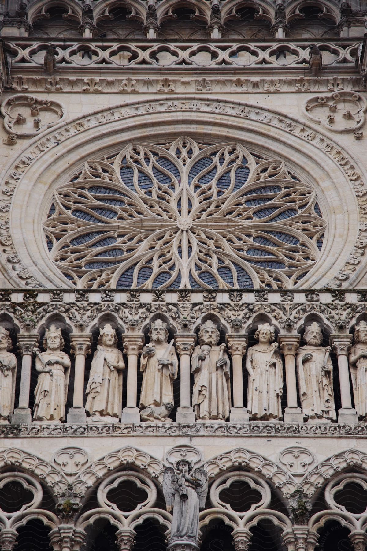 Exterior view showcasing the intricate gothic architecture of Cathédrale Notre-Dame d'Amiens, a venerable Catholic cathedral