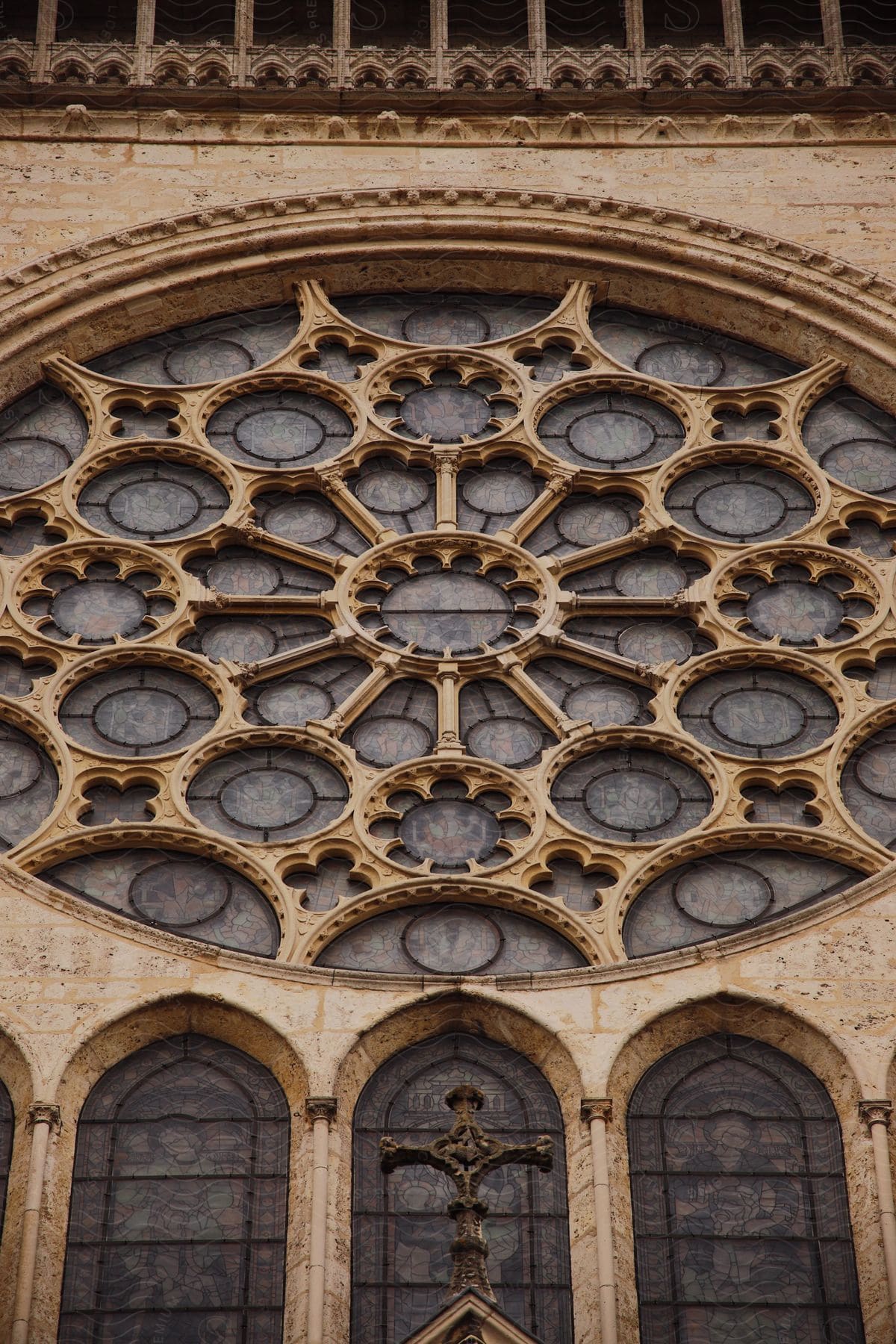 A glass decoration on top of a structure with ancient architecture.