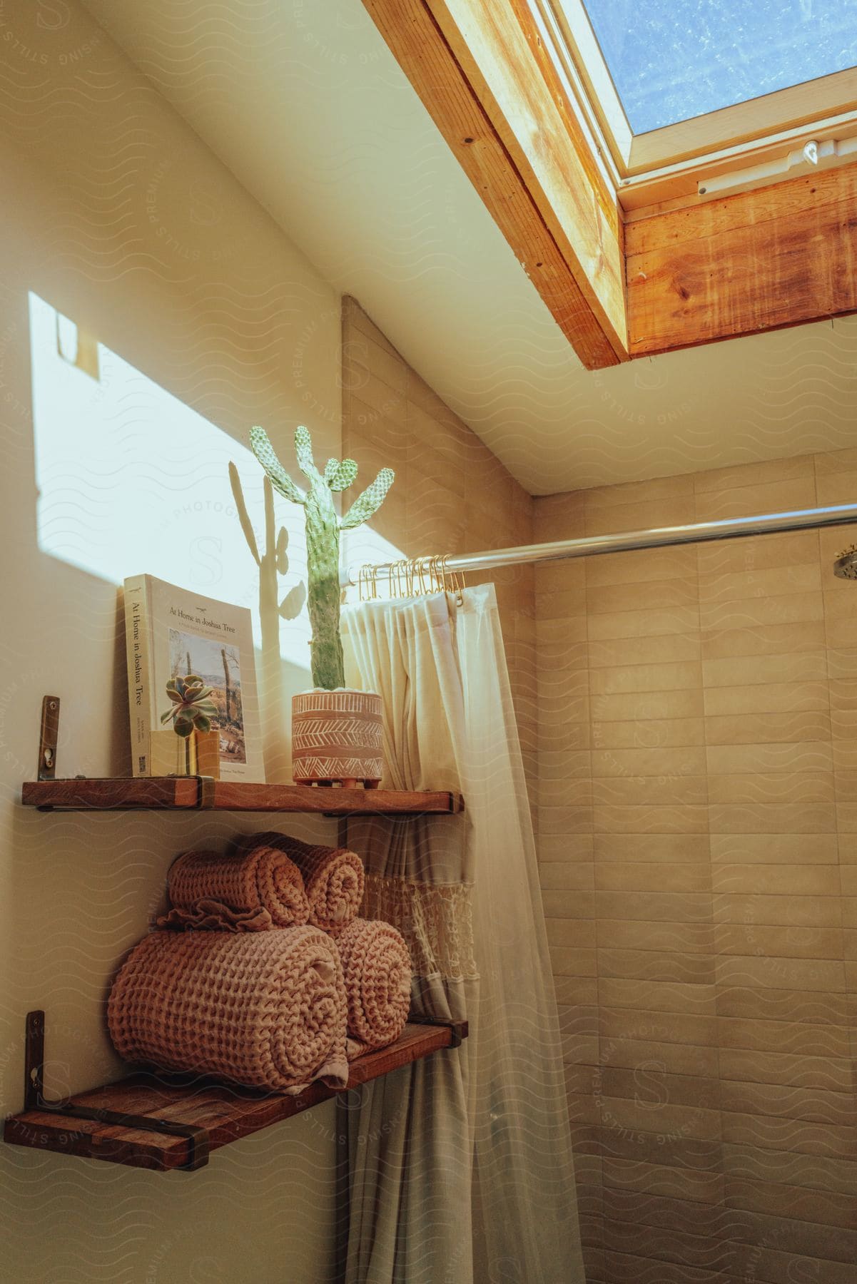 Interior design of a modern bathroom with sinks and towels.