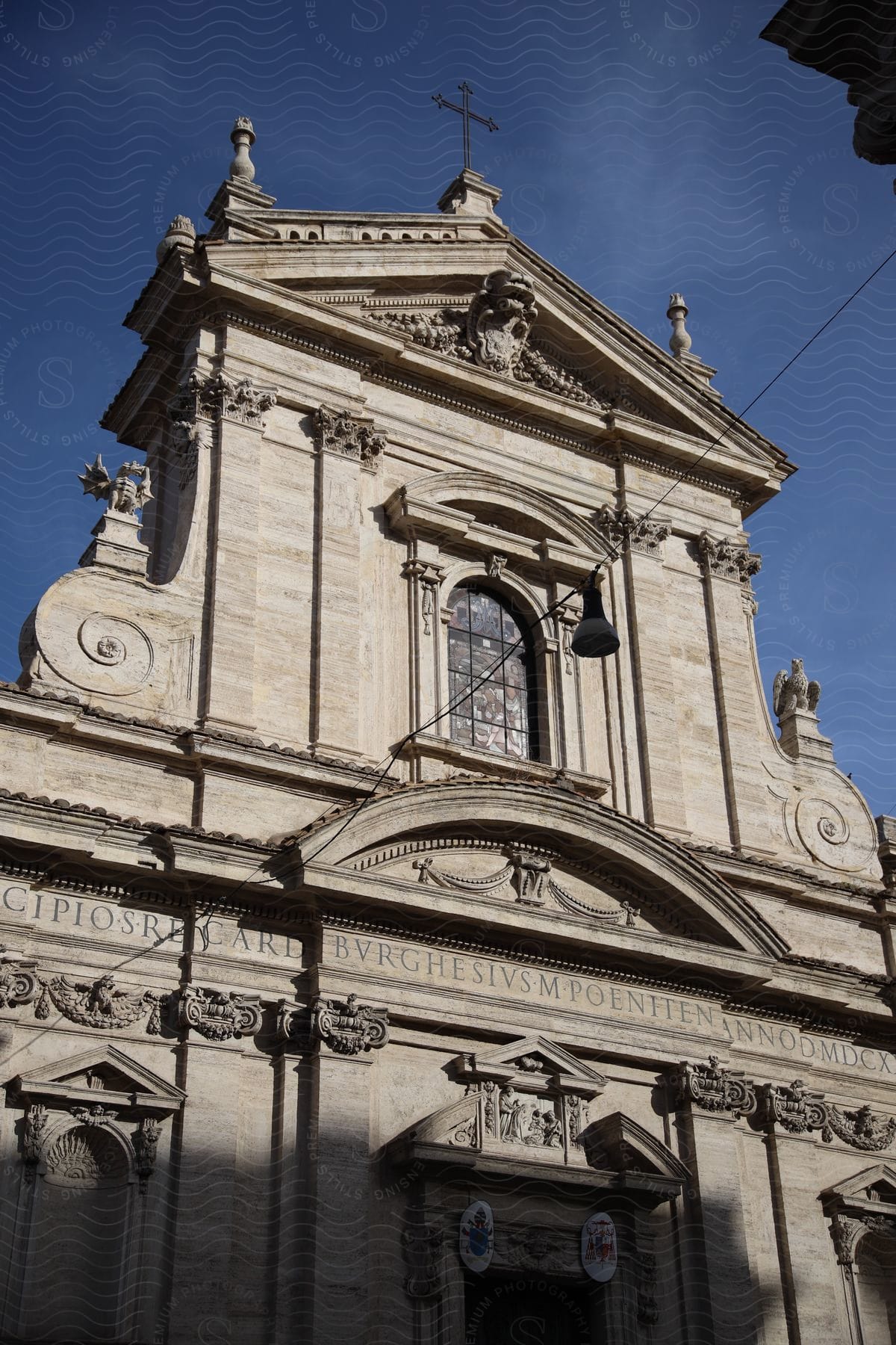 Statues stand on Santa Maria della Vittoria church in Rome