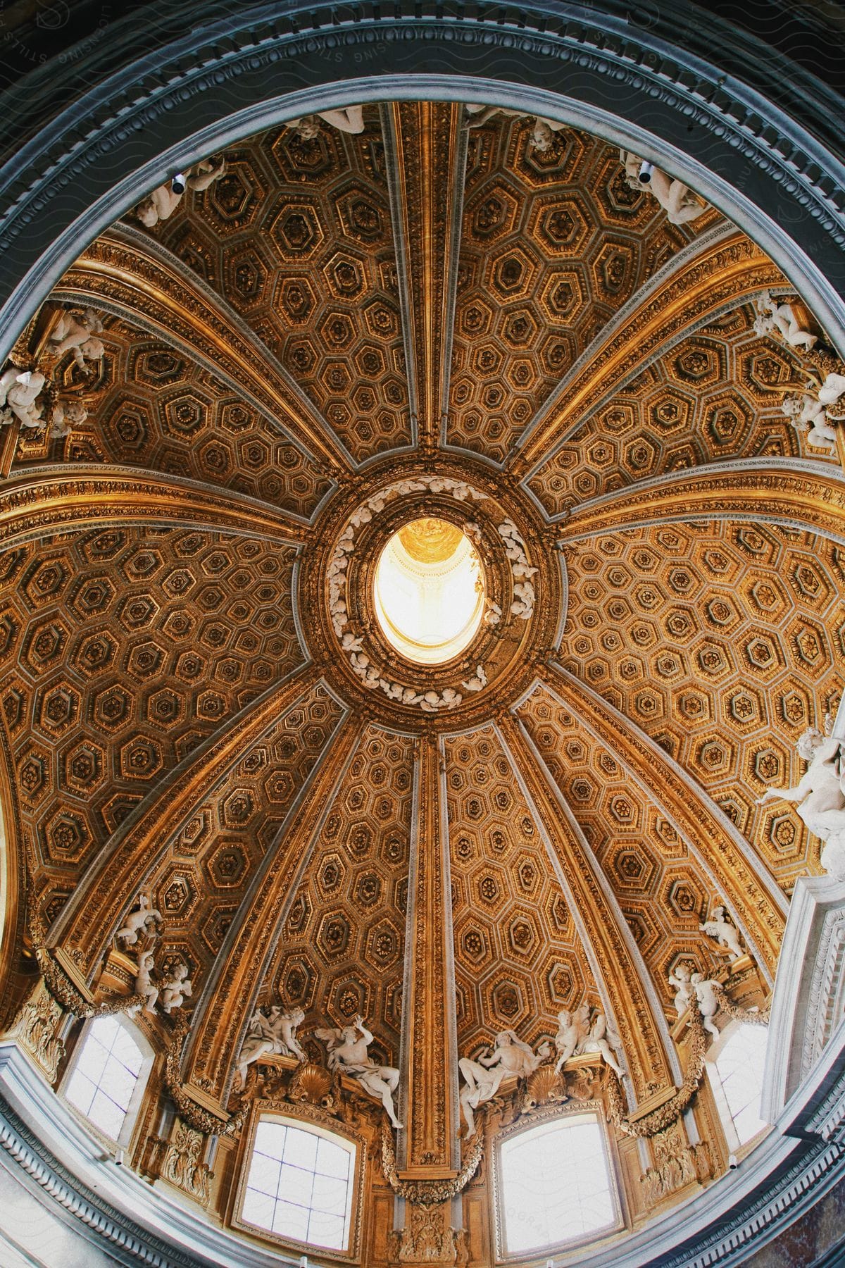 an ancient artistic roof with circular design and a round opening in the middle that allows sunlight through