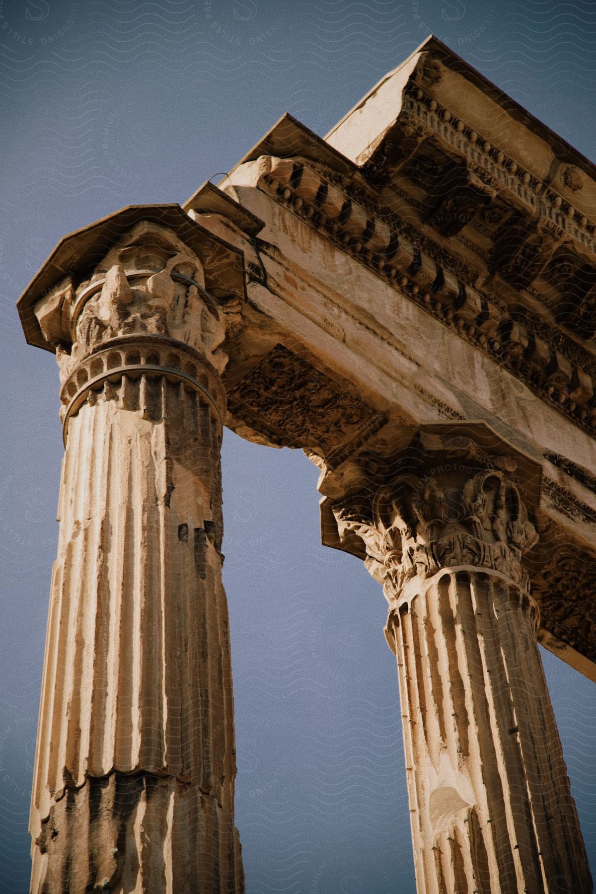 Dilapidated pillars hold up the remains of an ancient building