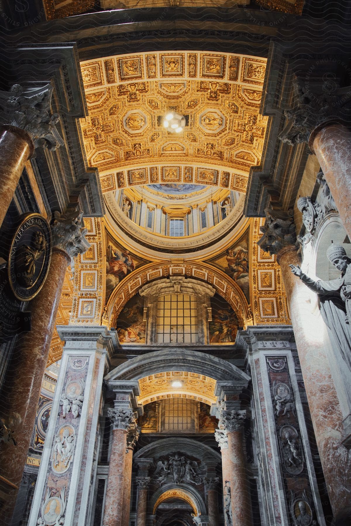 A view of the ceiling and pillars in a large church.