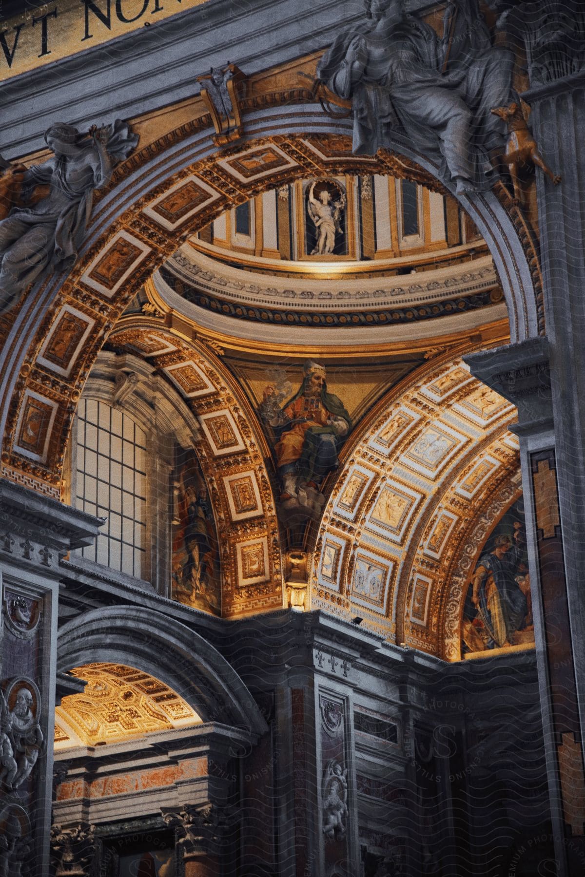 the ceiling of an ancient structure with arts and sculptures of people depicting ancient times