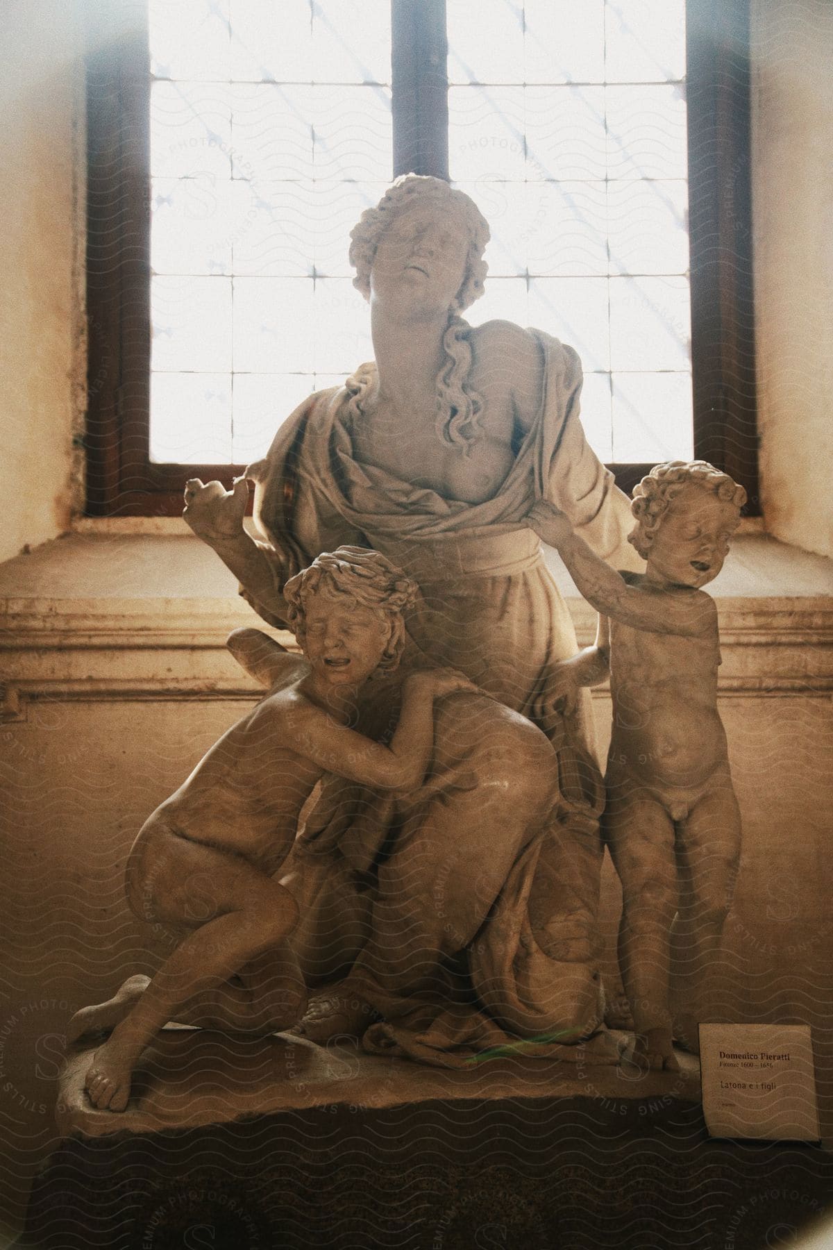 a sculpture of Latona and her sons Domenico Pieratti as they both held on to her in terror with one of her breast exposed
