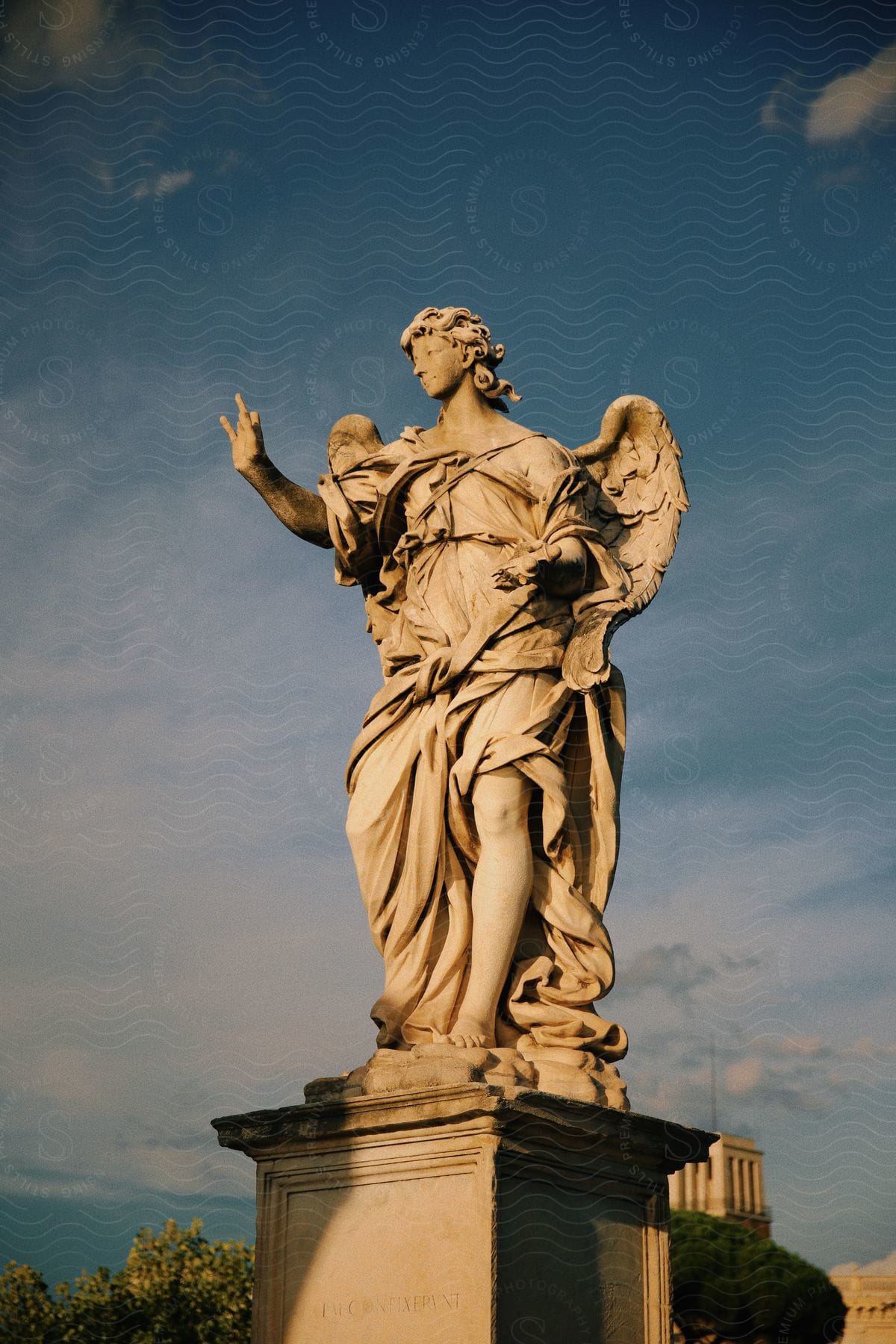 An angelic sculpture bathed in sunlight.