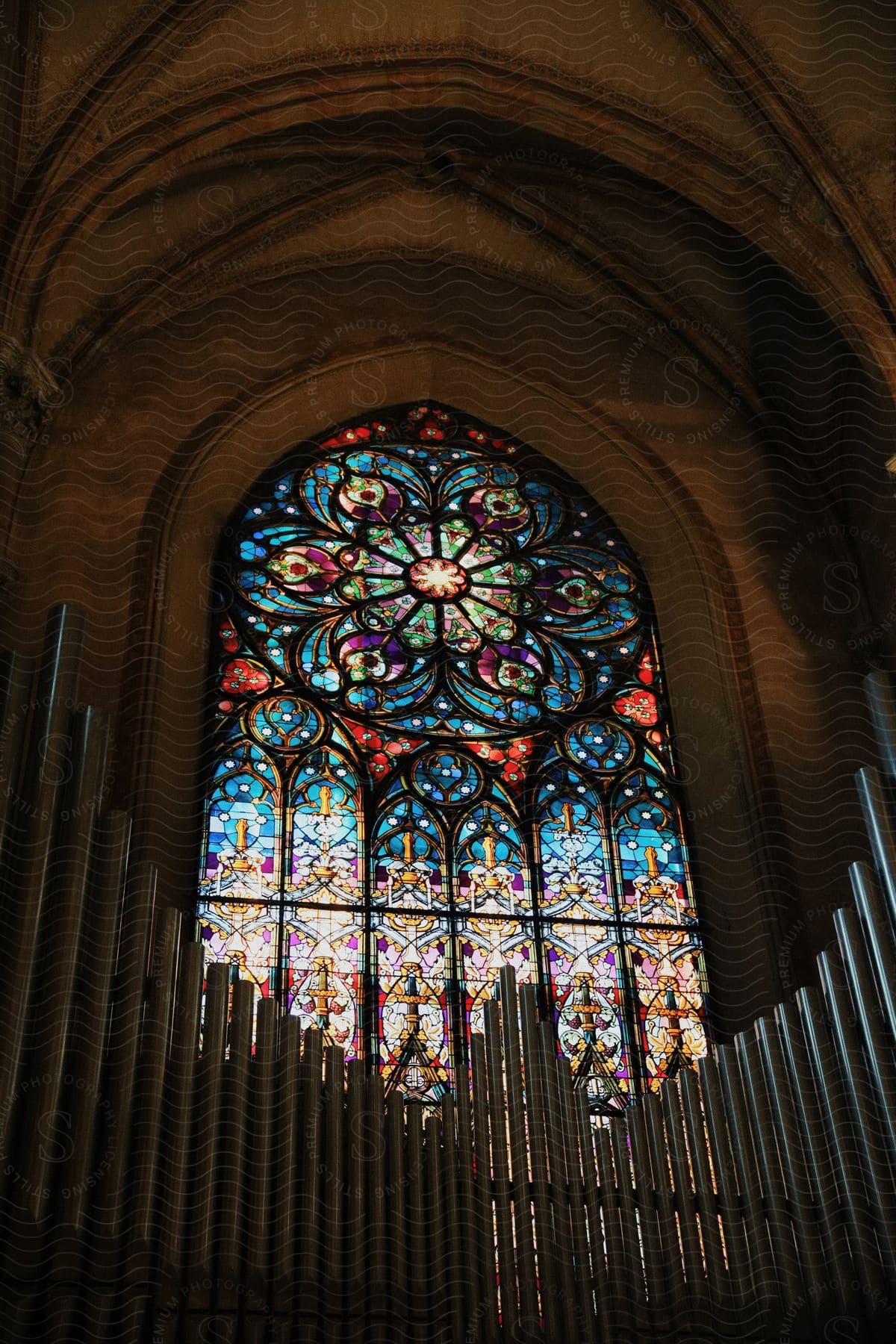 Stained glass window from inside a church.