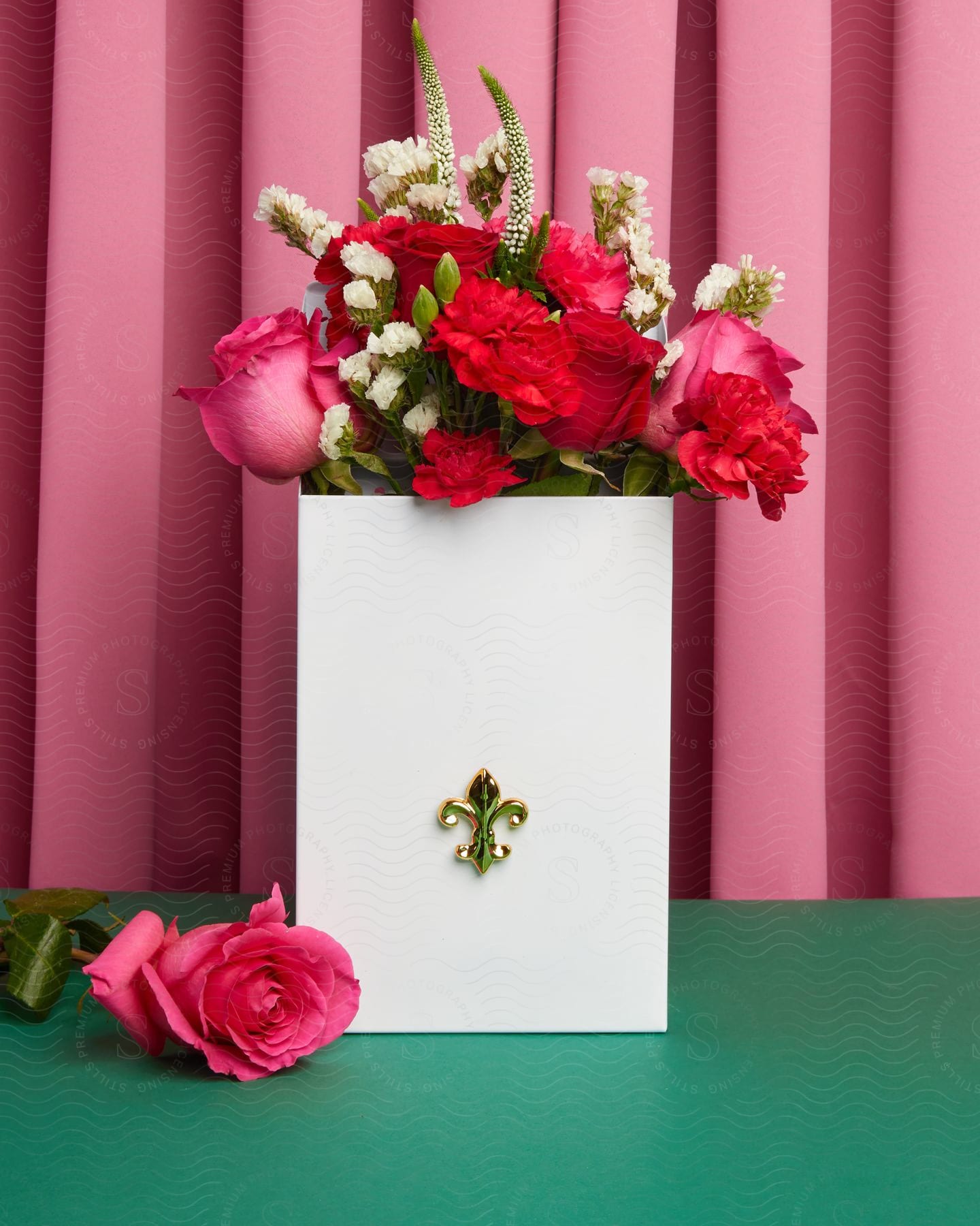 Some Flowers Sitting In A Box On A Table