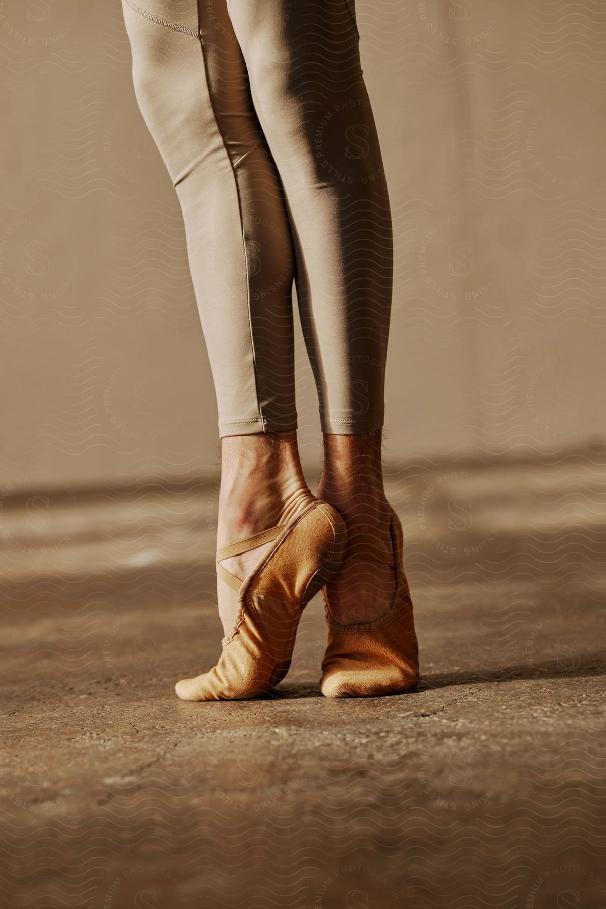 Close-up on the legs of a dancer.