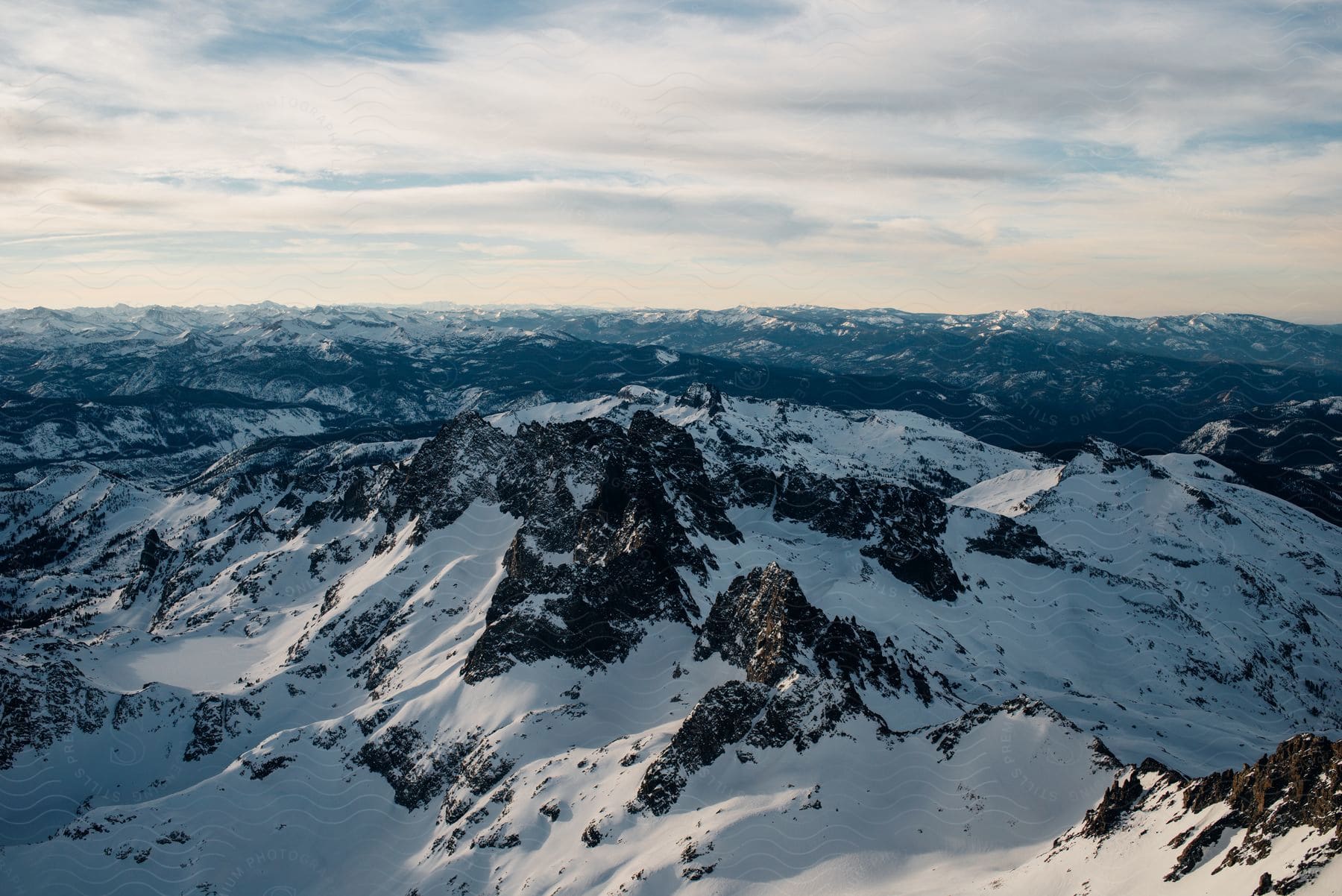 a mountain covered in snow on a clear day during winter