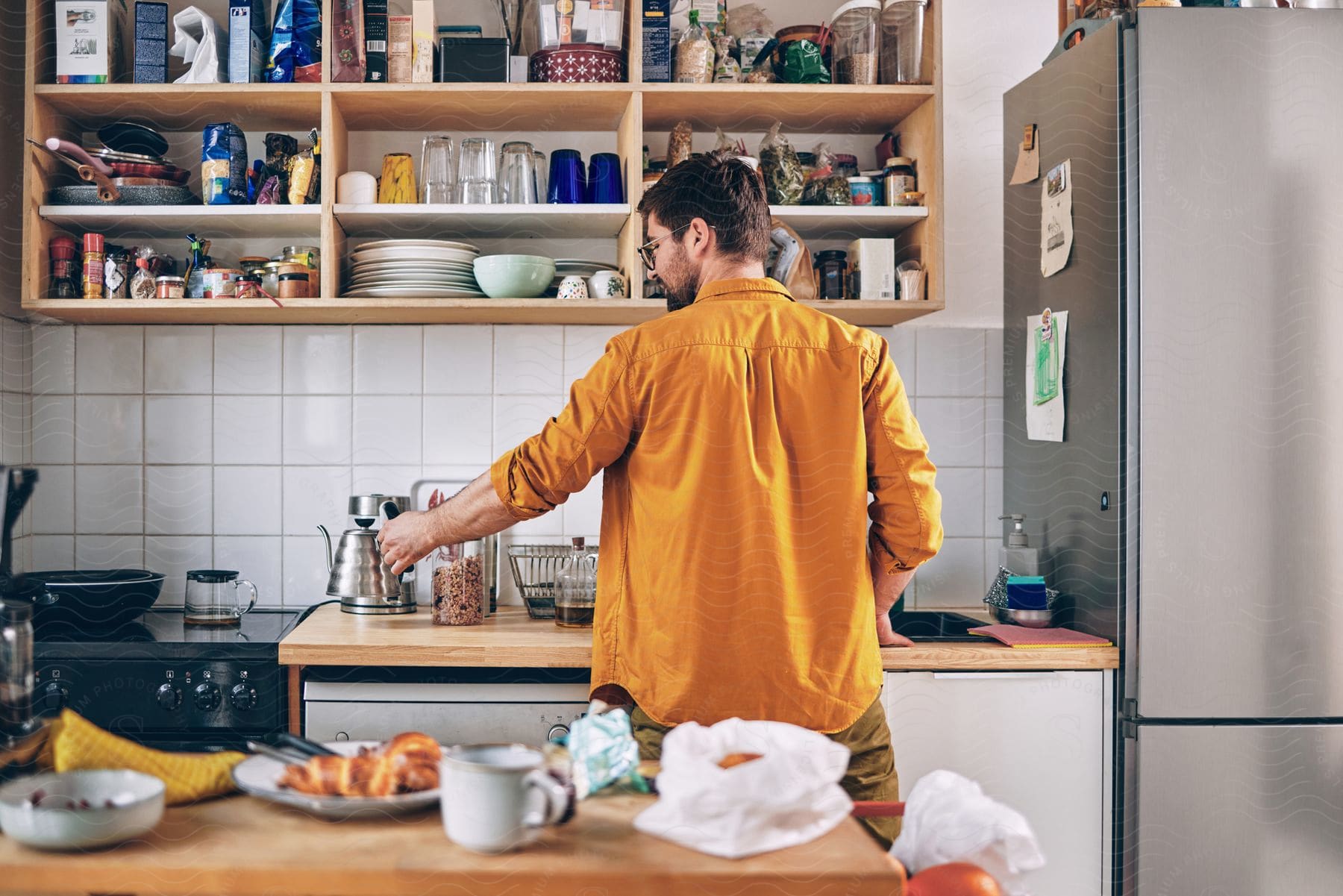 A person making food in a kitchen