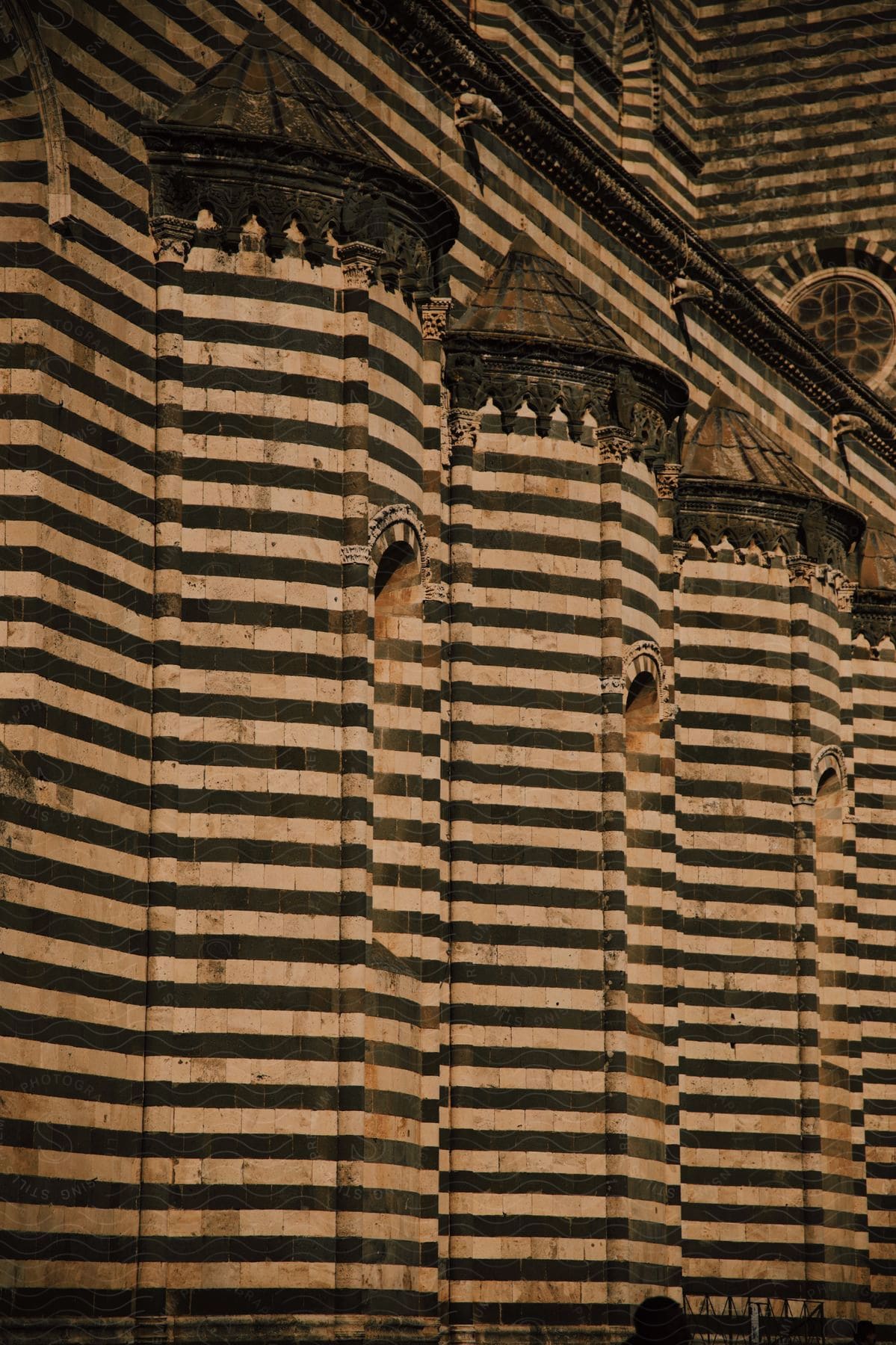 The striped walls of an ancient castle.