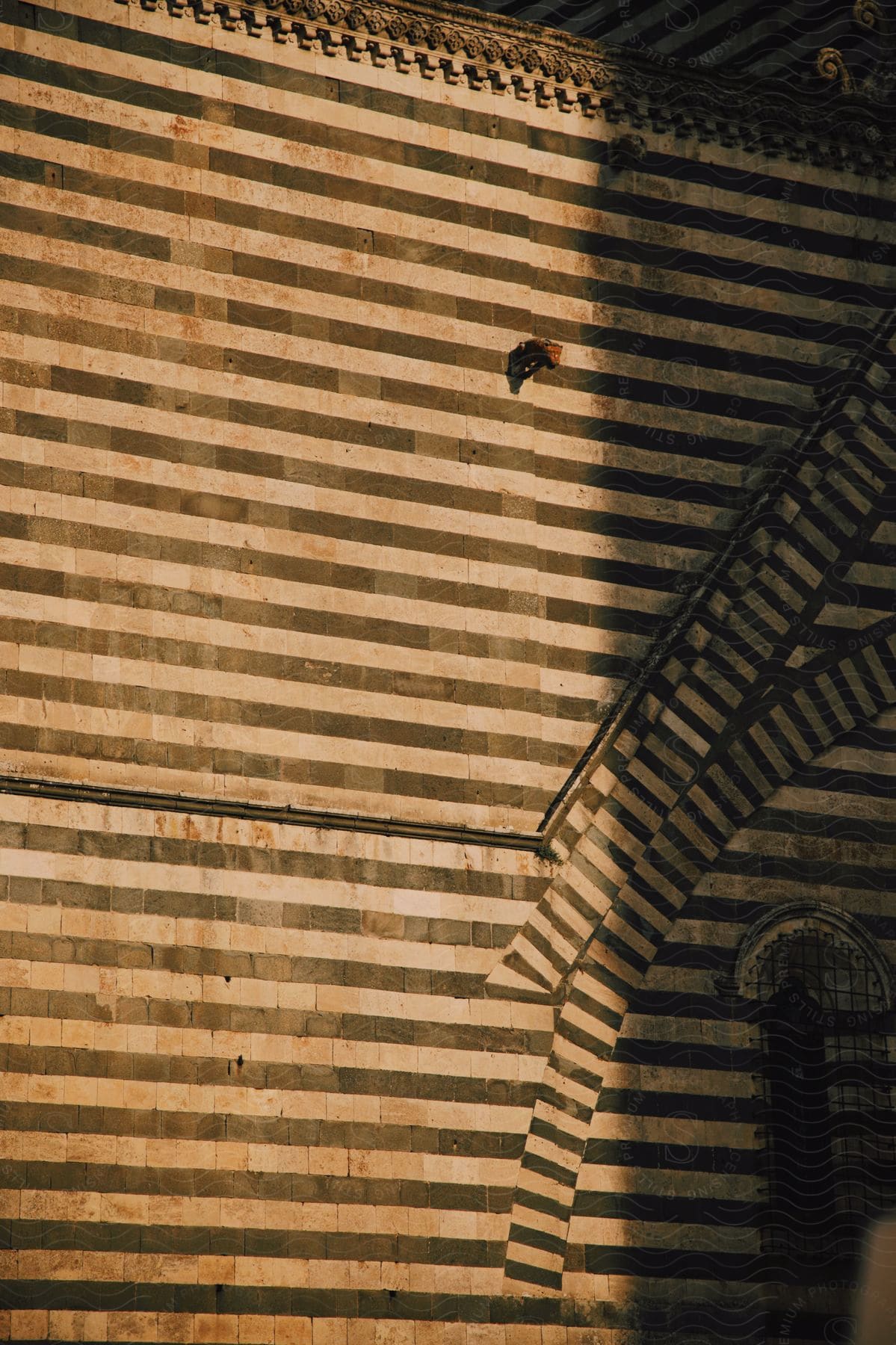 tan and black striped wall architectural details