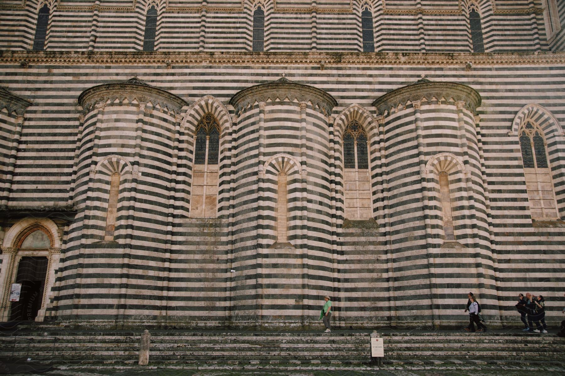 exterior of striped ancient church building