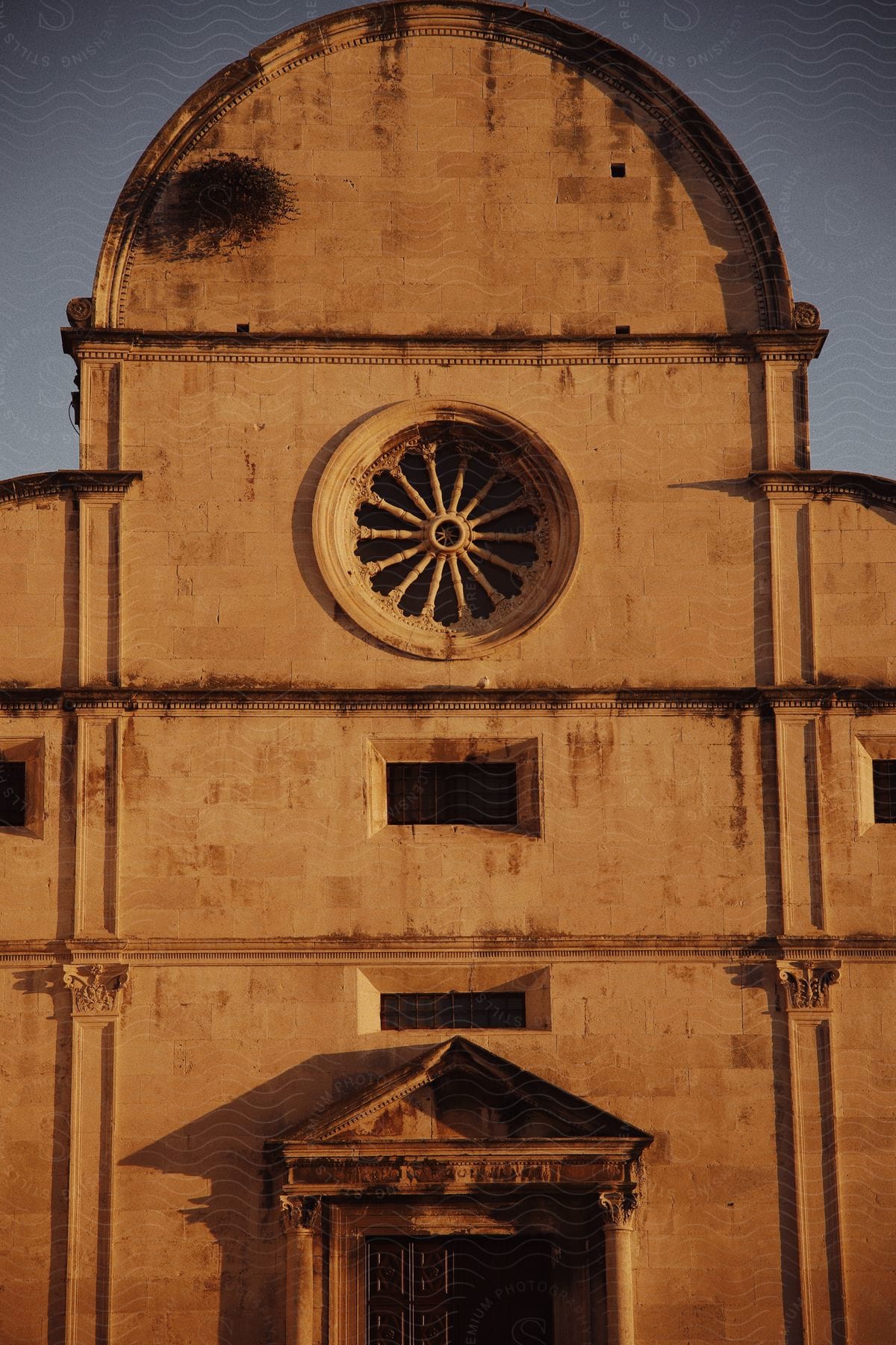 Rose window on a building of ancient architecture