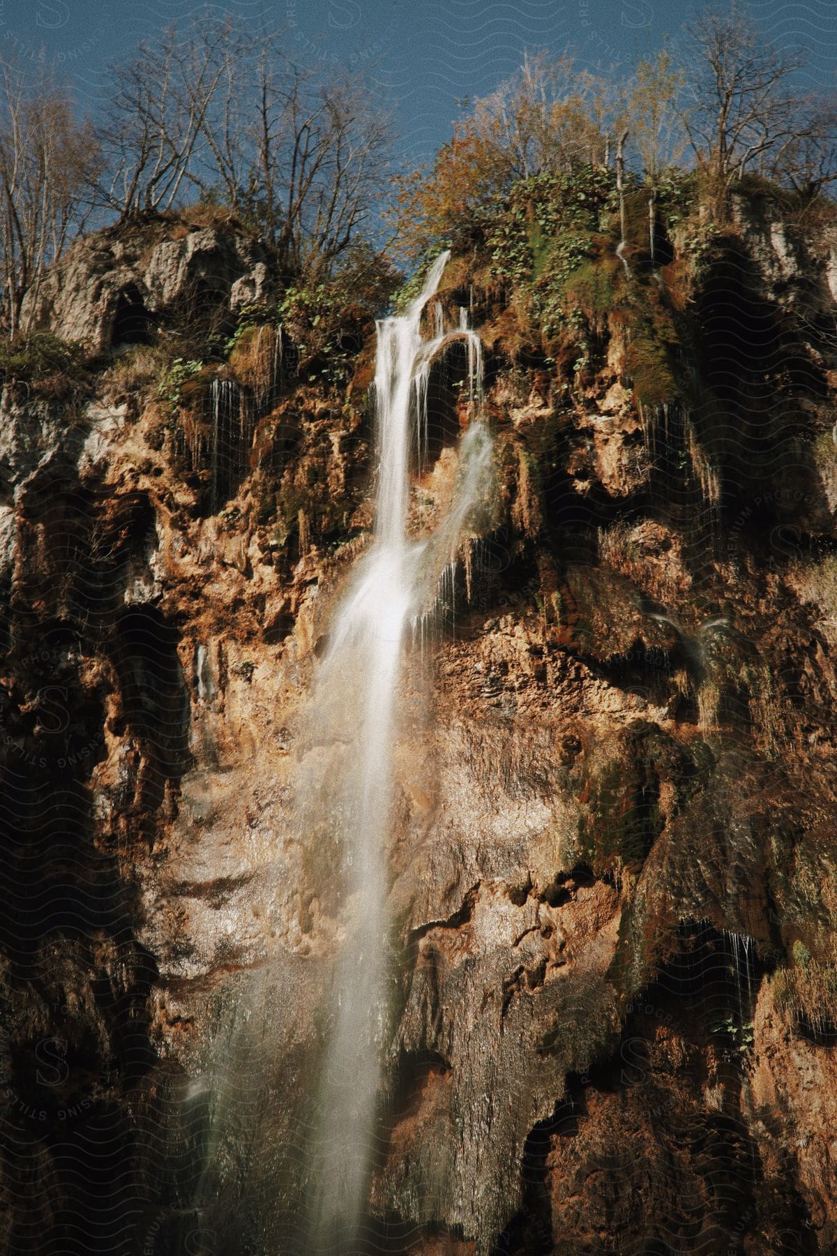 View of a waterfall with cascading water.