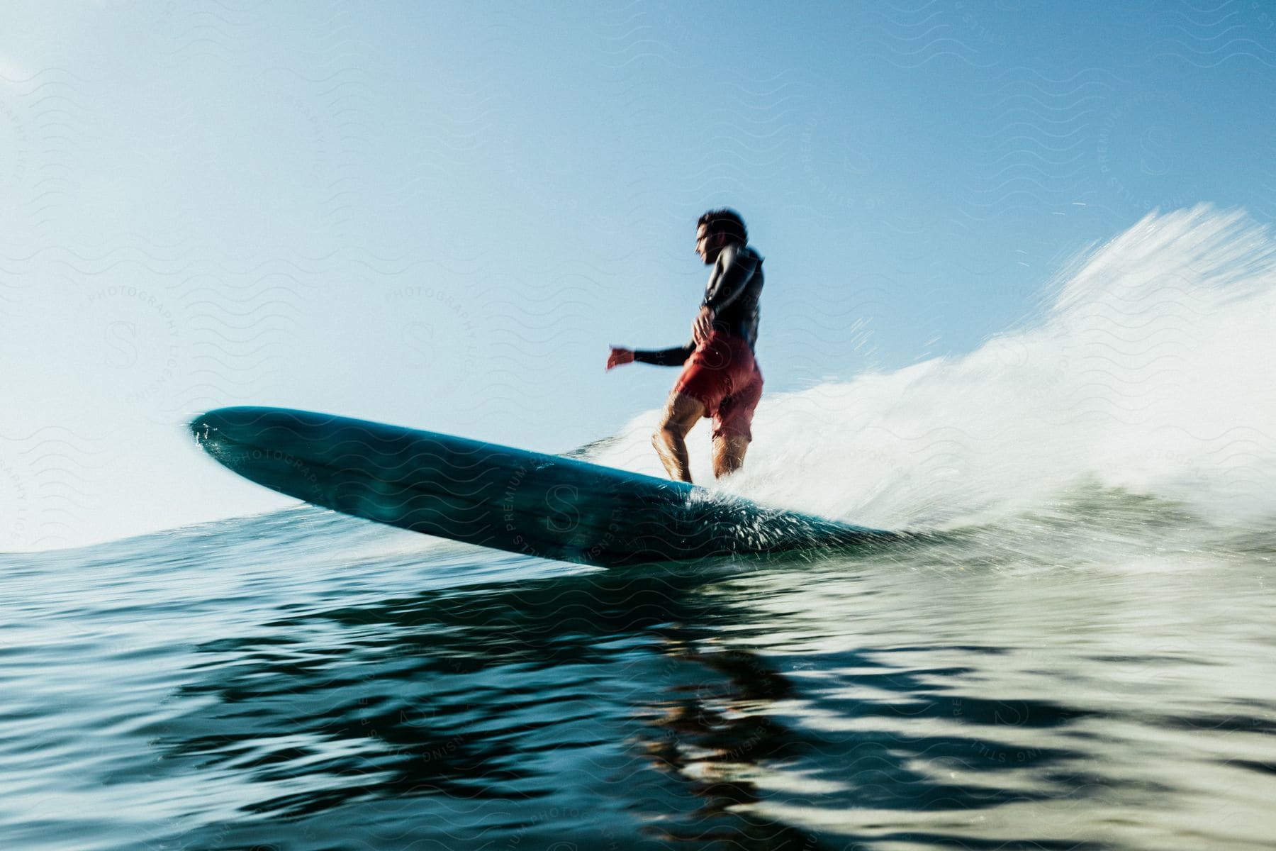 A surfer riding a wave.