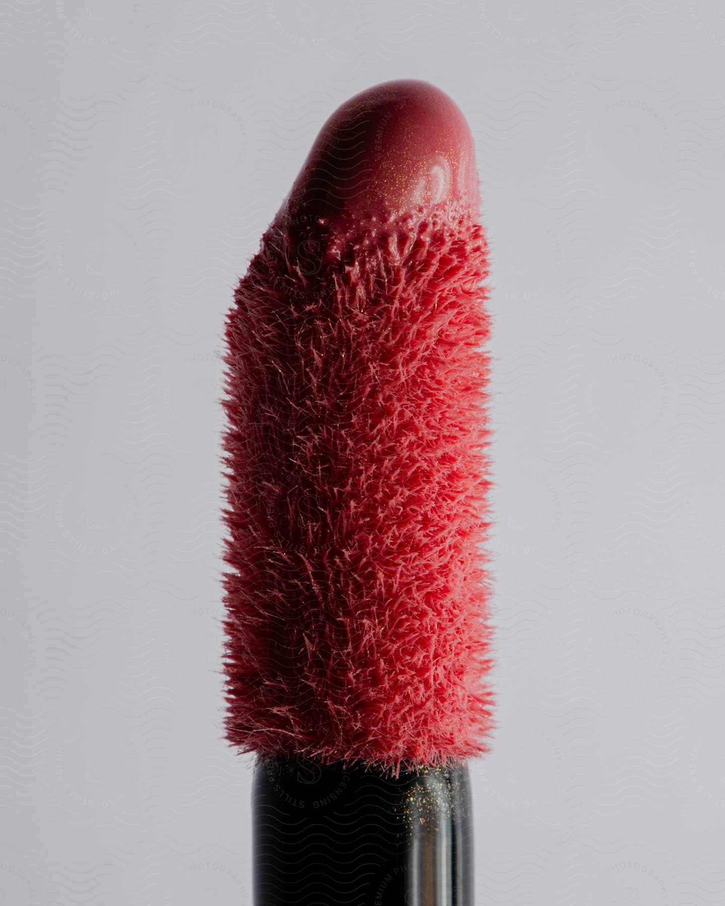 Stock photo of close up view of creamy lipstick