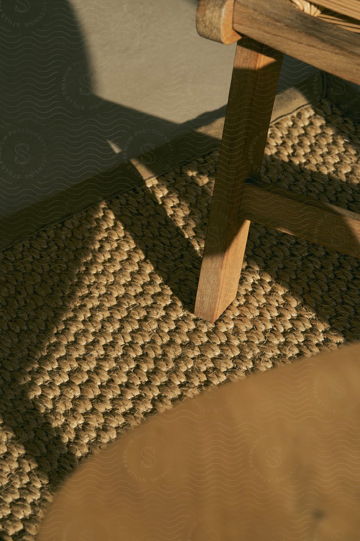 A view of some chairs in a room on carpet.