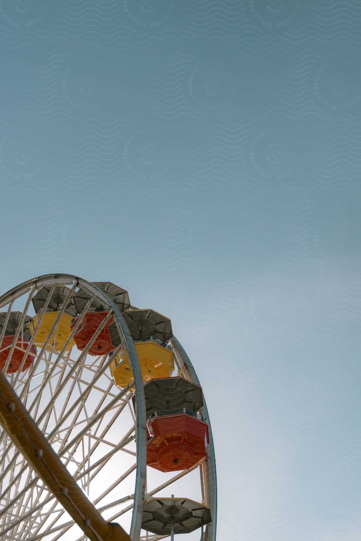 A Ferris wheel carnival ride high in the sky