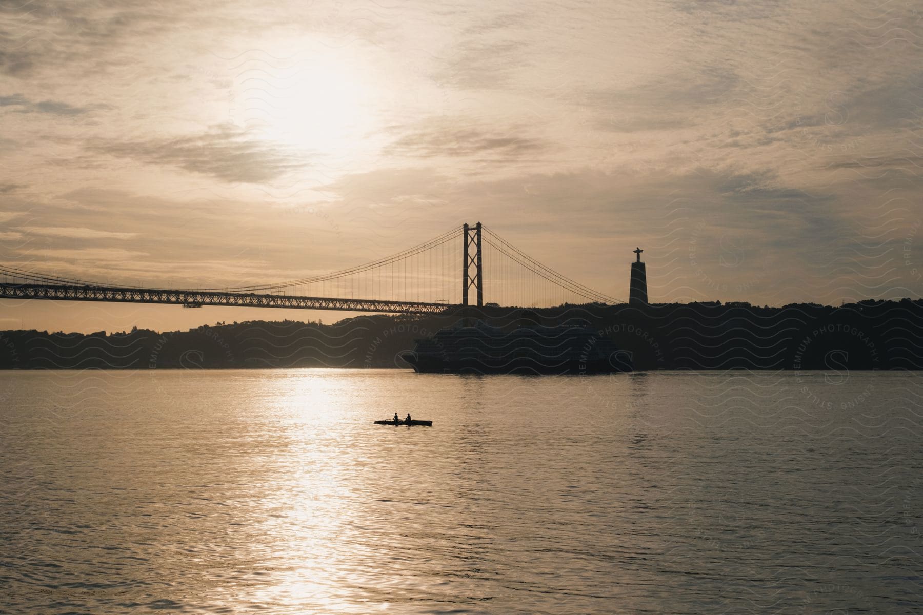 Stock photo of exterior view of 25 de abril bridge with the christ the king sanctuary