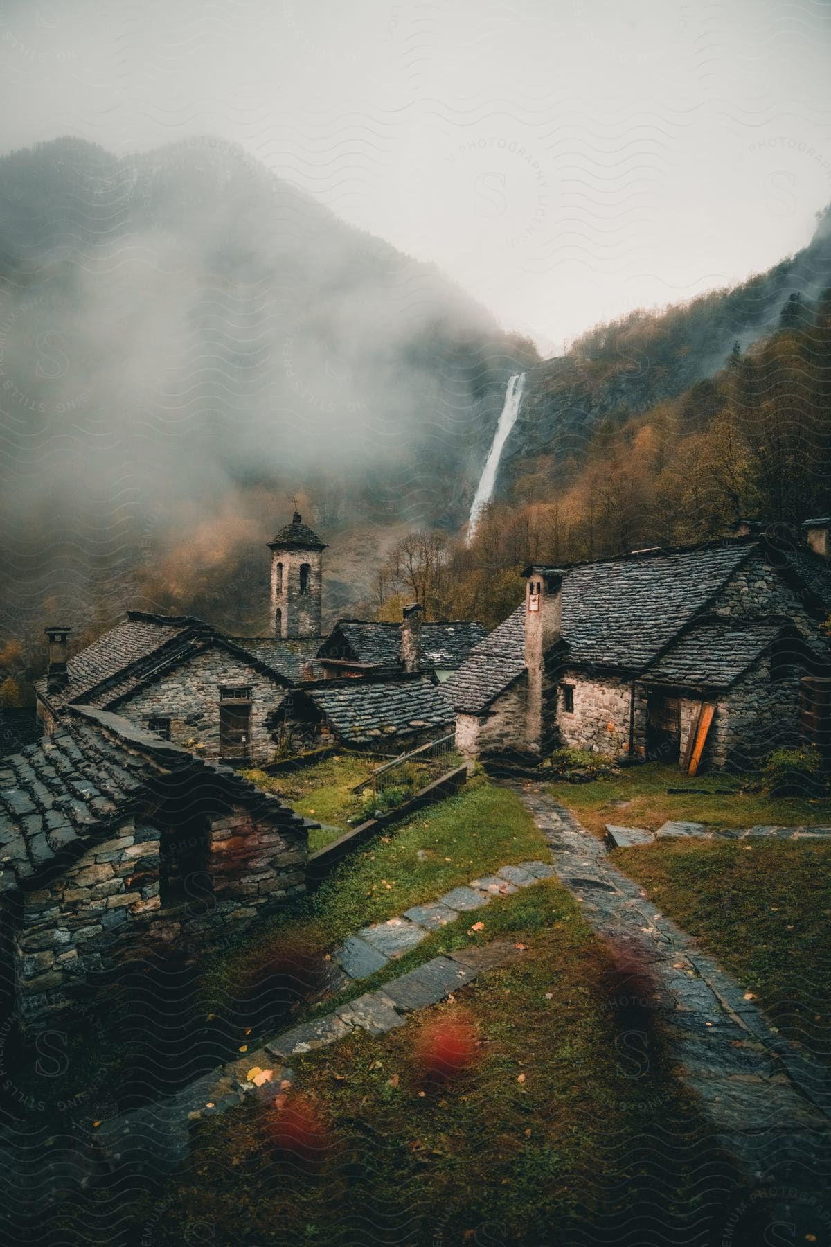 Stock photo of houses made of stone in foroglio, a village tucked away in the bavona valley, located in the canton of ticino, switzerland.