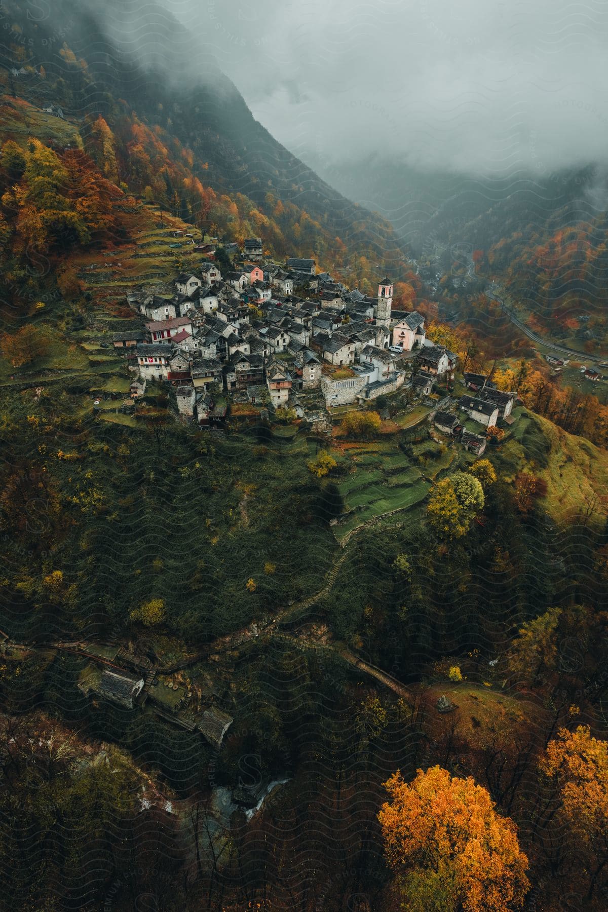 Aerial view of a small town on mountain slope