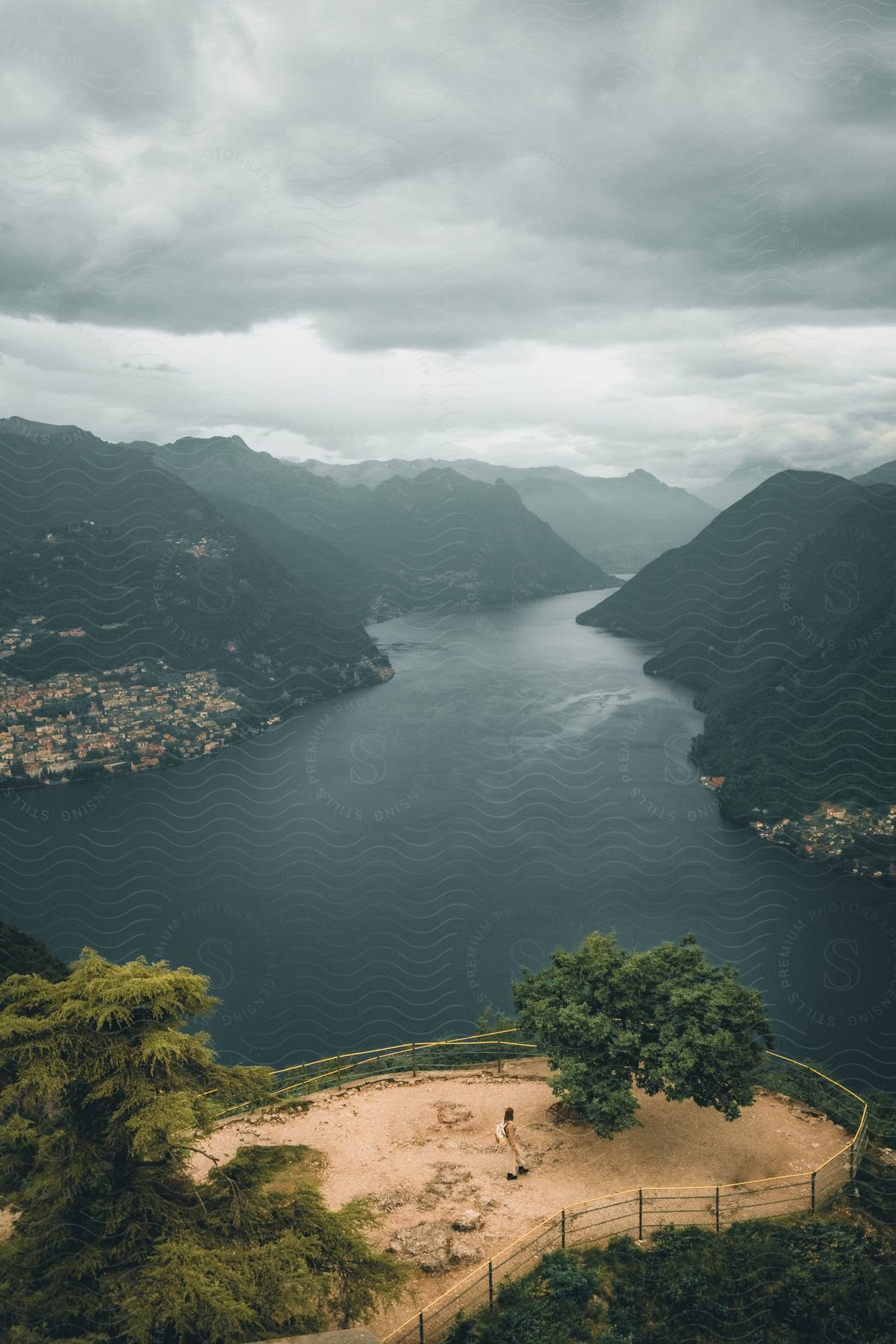 An aerial view capturing the Observatory on top of Monte Salvatore, offering a panoramic vista of Lugano Lake, Monte Bre, Caprino, and the Swiss-Italian borderline.