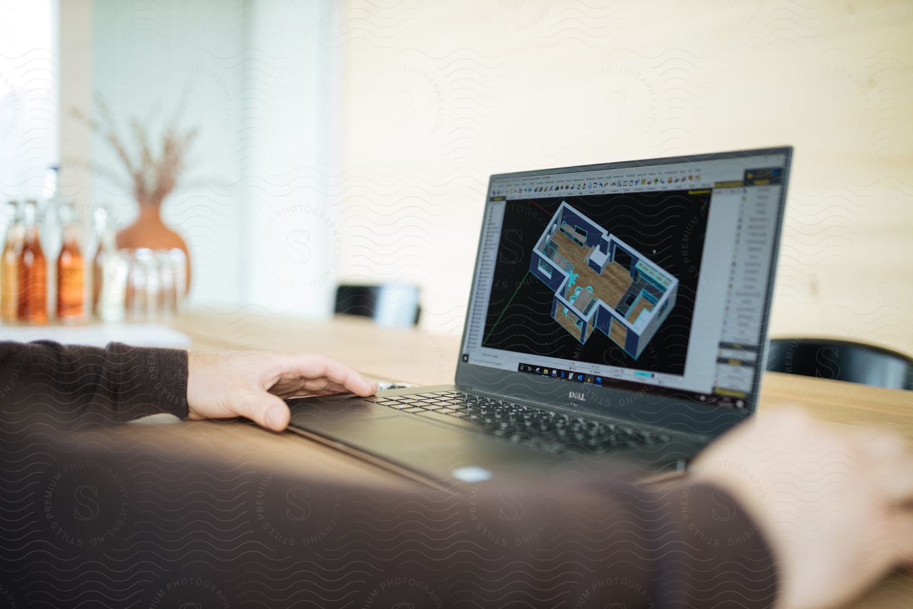 Interior Room Design Software On A Laptop On A Conference Table