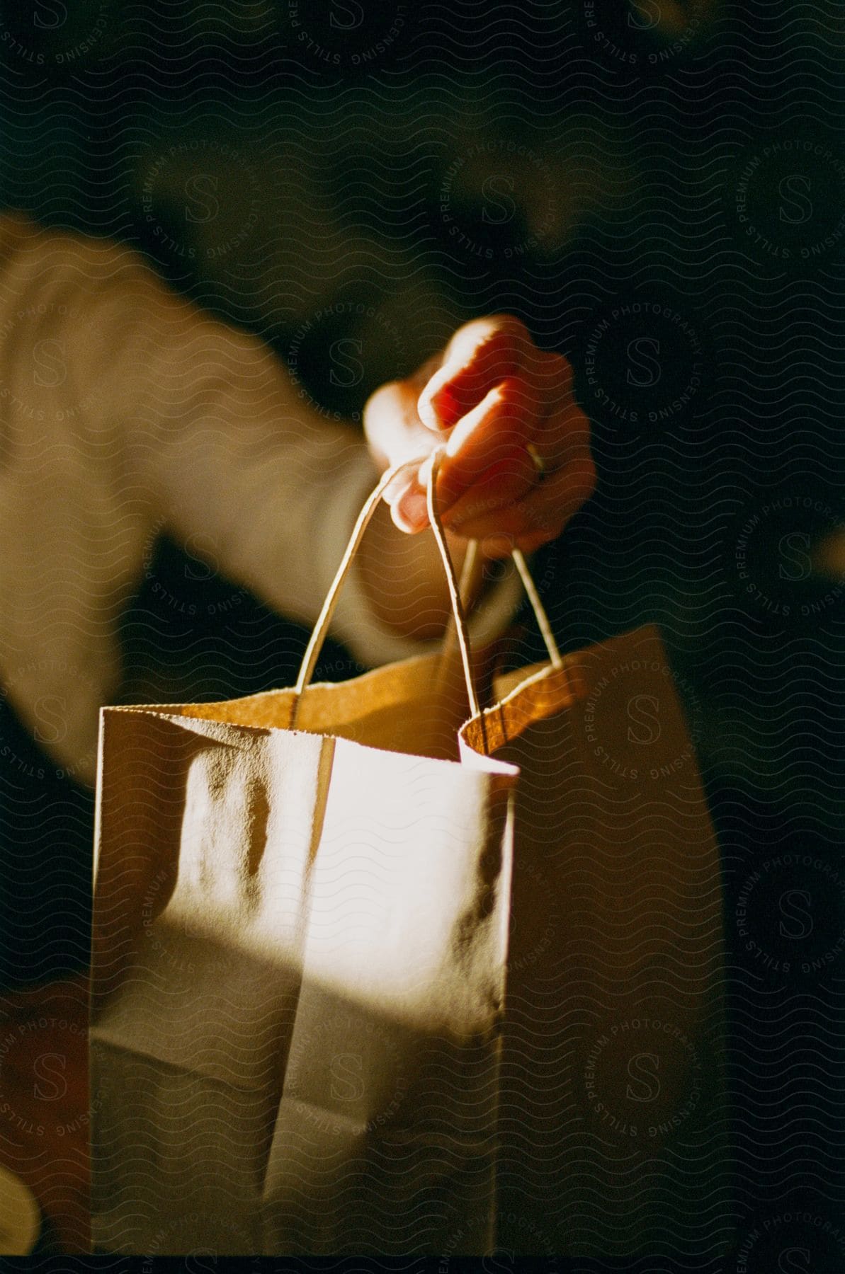 a woman holding a shopping bag