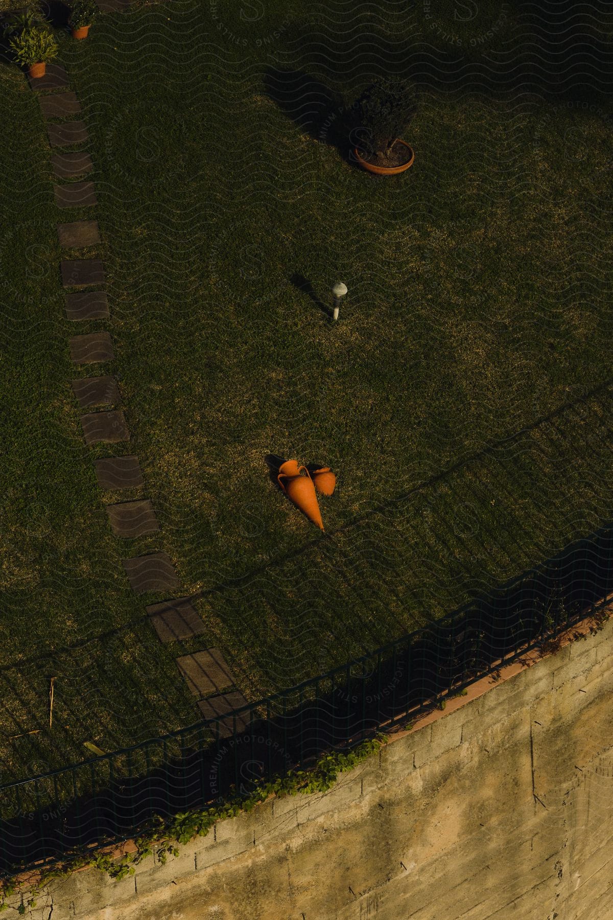 Some items laying on grass in a yard.