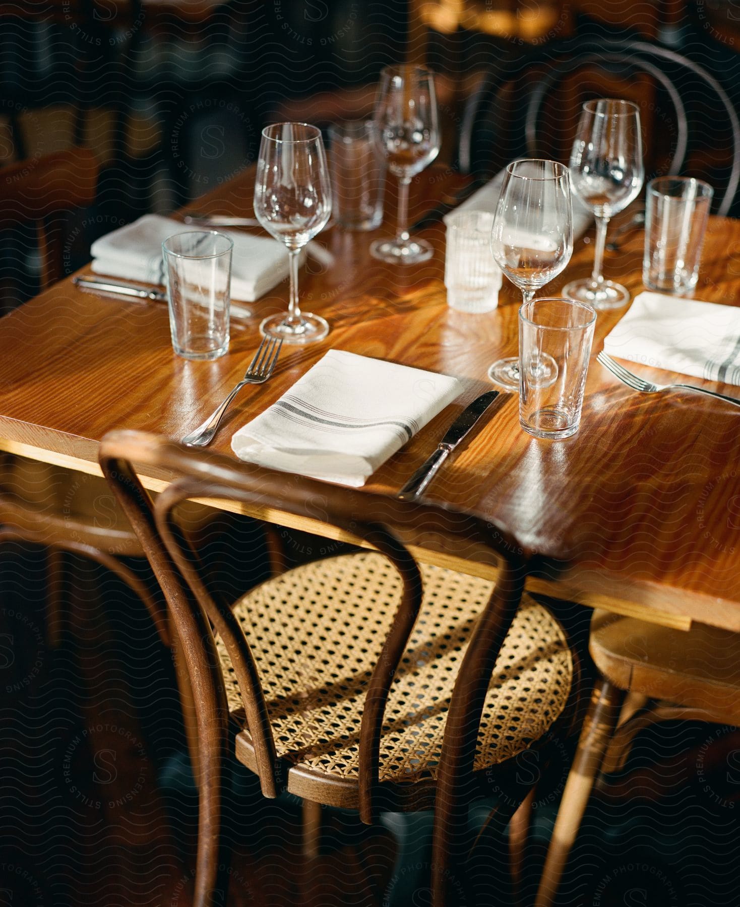 A table that is set for guests at a restaurant.