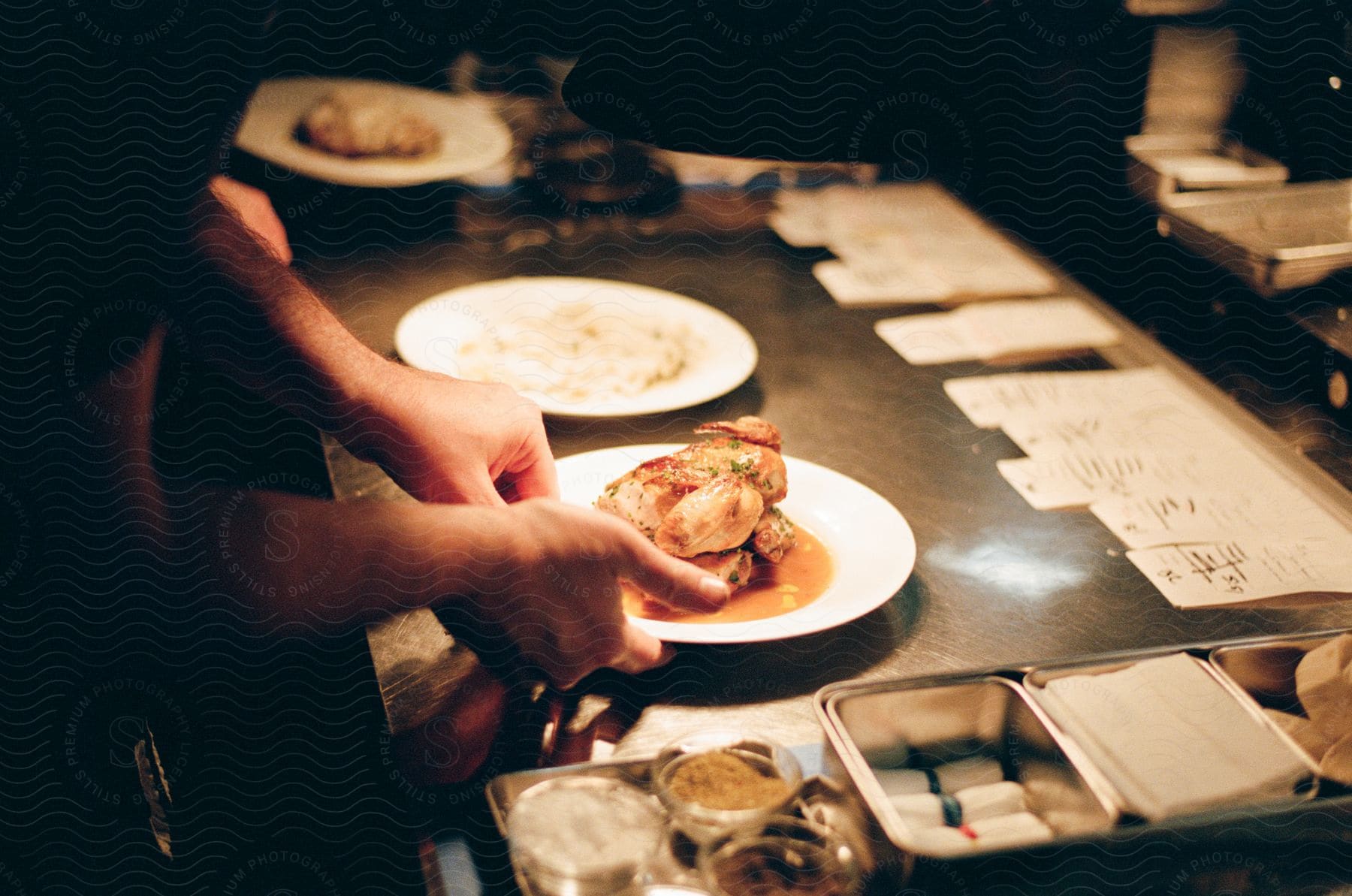 A chef serving up food in a restaurant