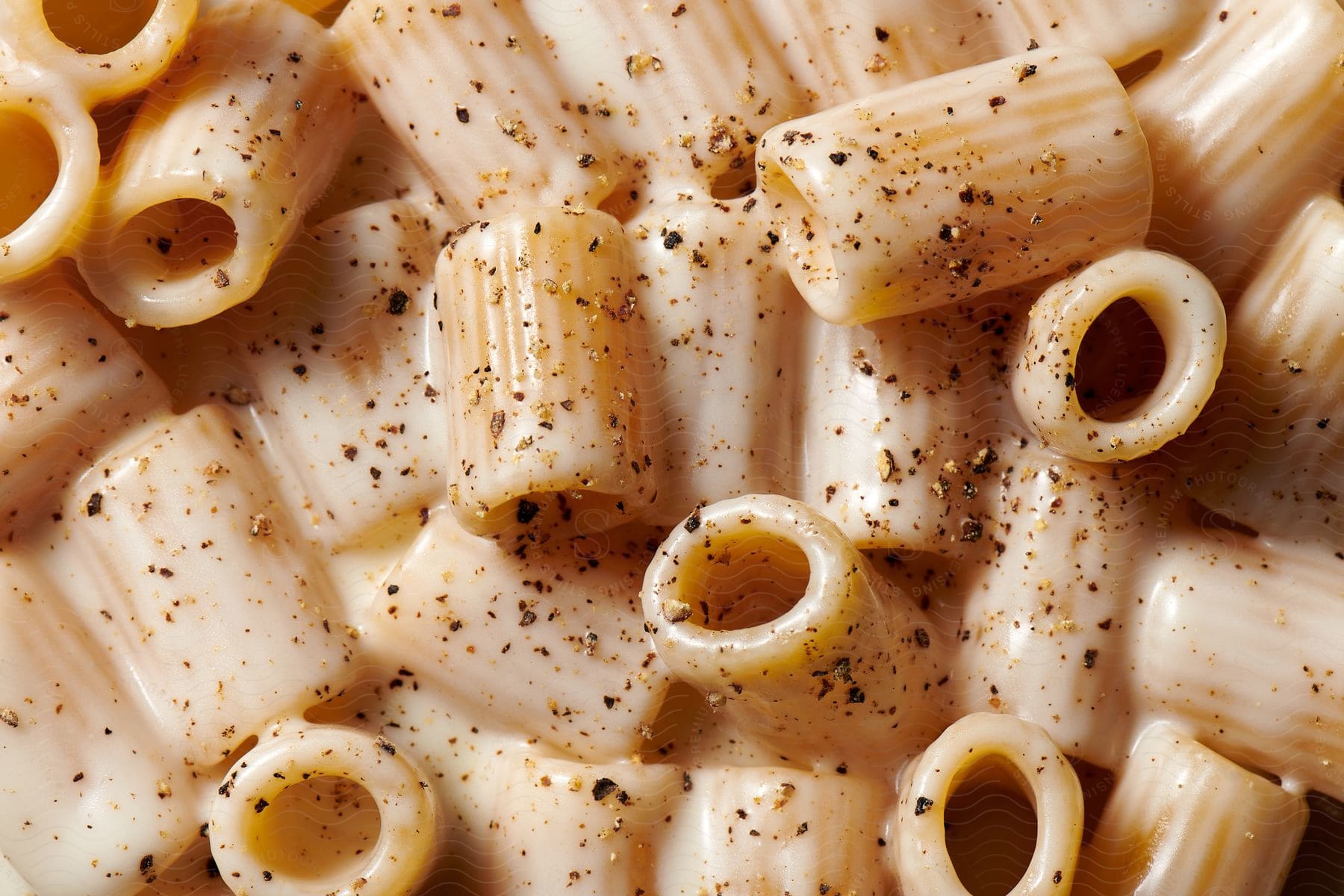 Stock photo of close-up of pasta with white sauce.